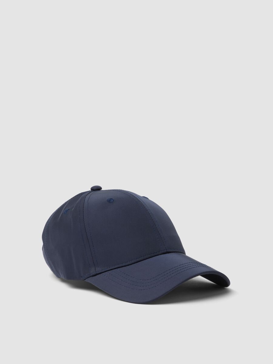 Blue cap with curved peak_0