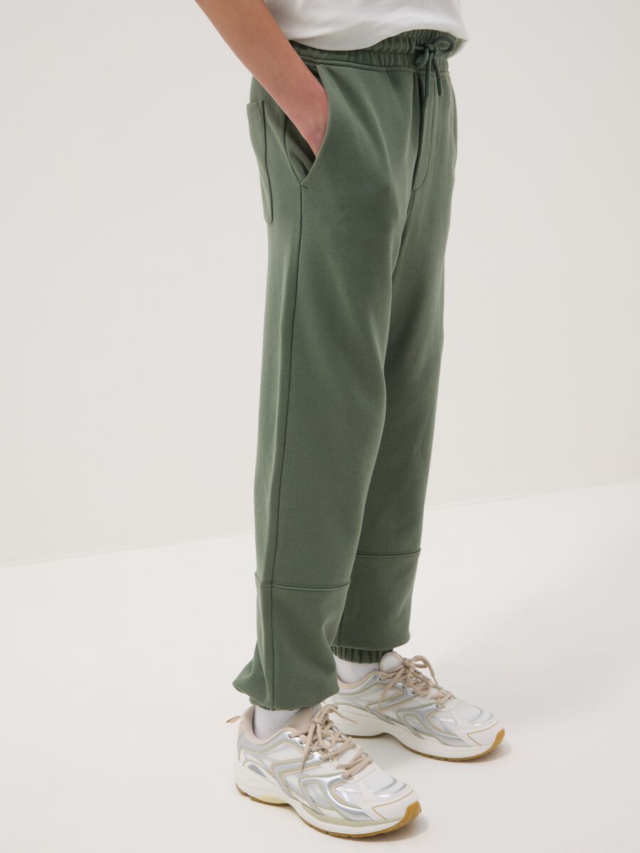 Organic cotton green jogger trousers with regular fit for boys_1