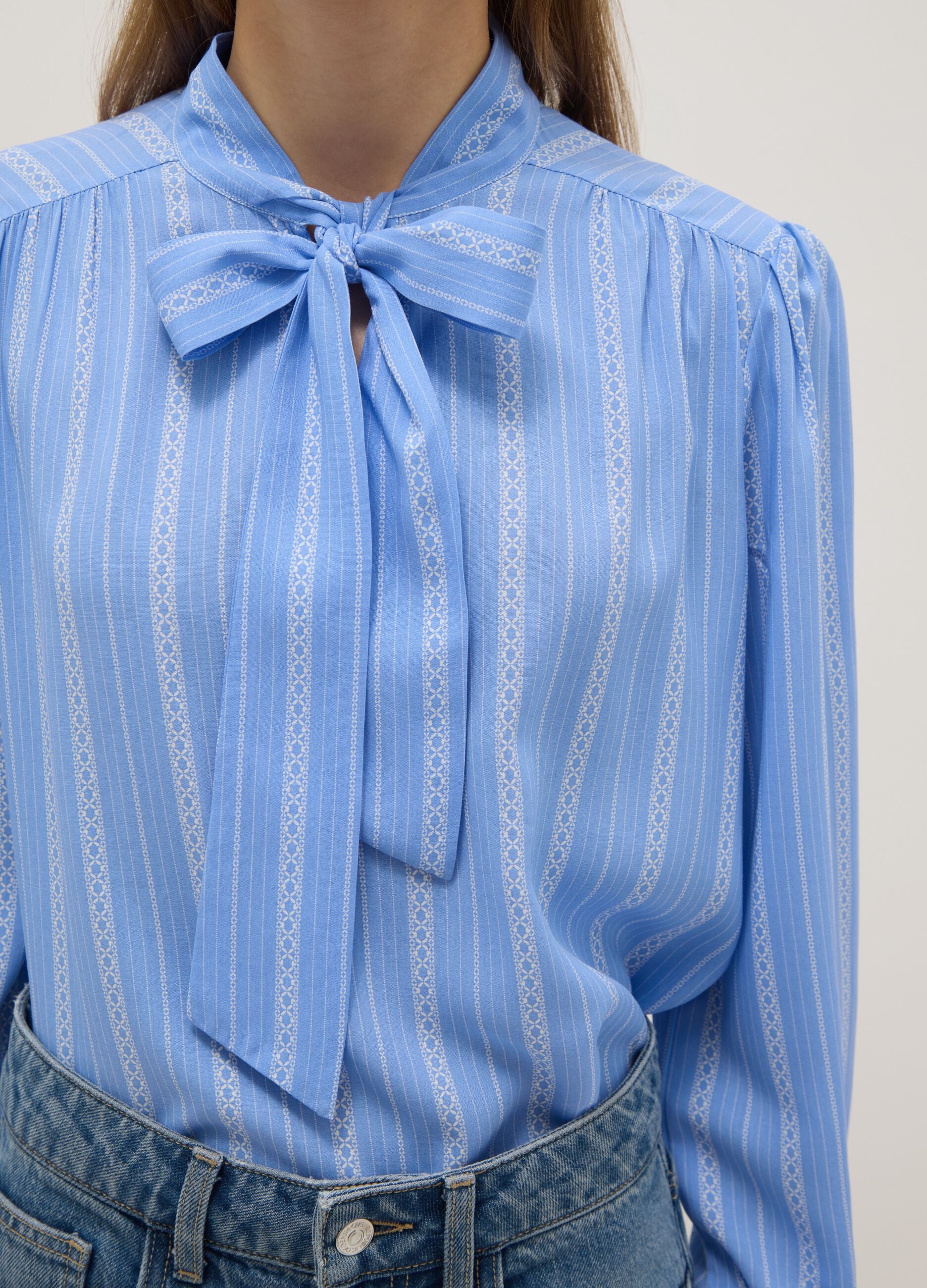 Light blue pure viscose shirt with bow and striped pattern