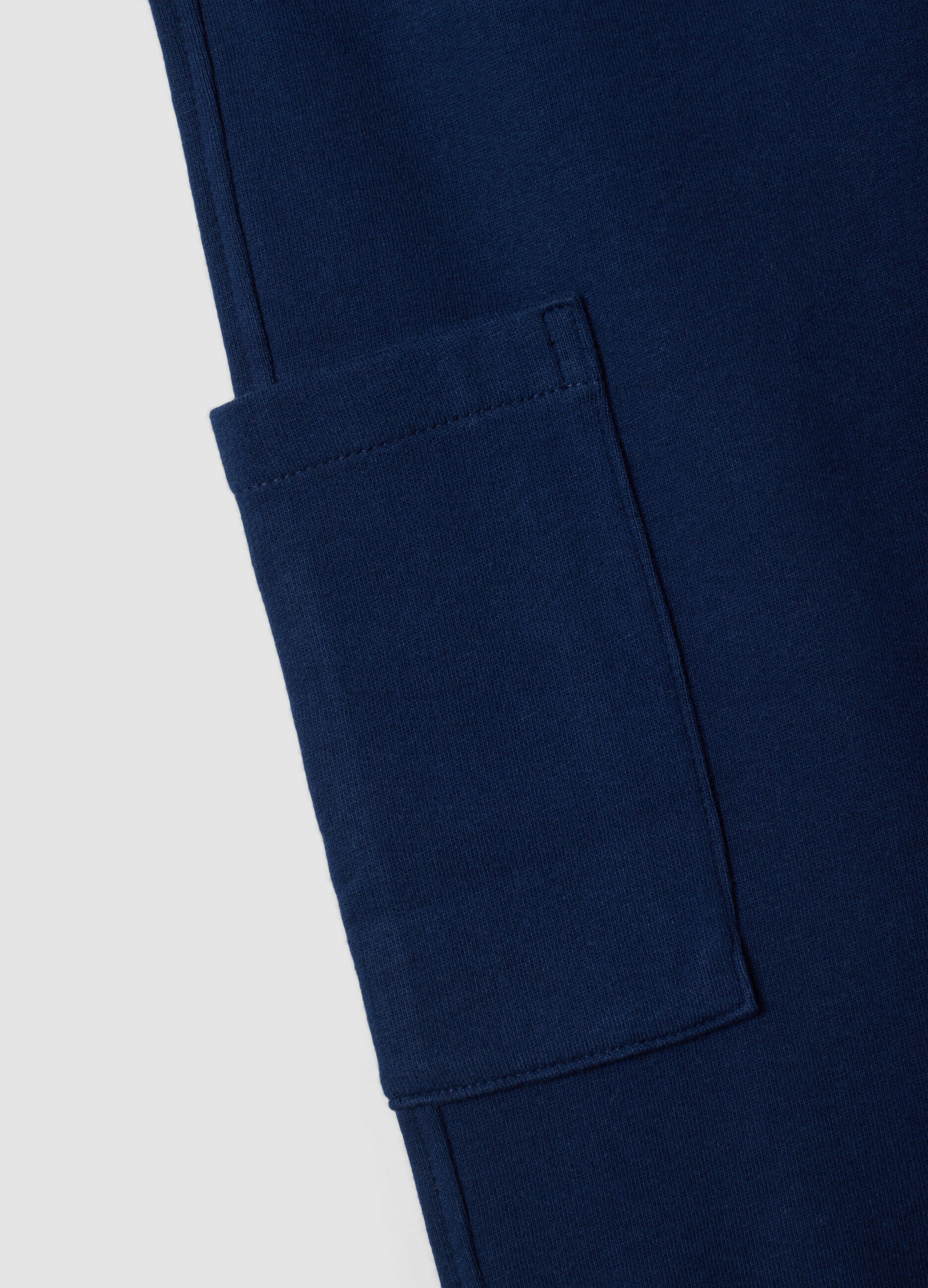 Pantaloni jogger blu in puro cotone organico con tasche cargo per bambino