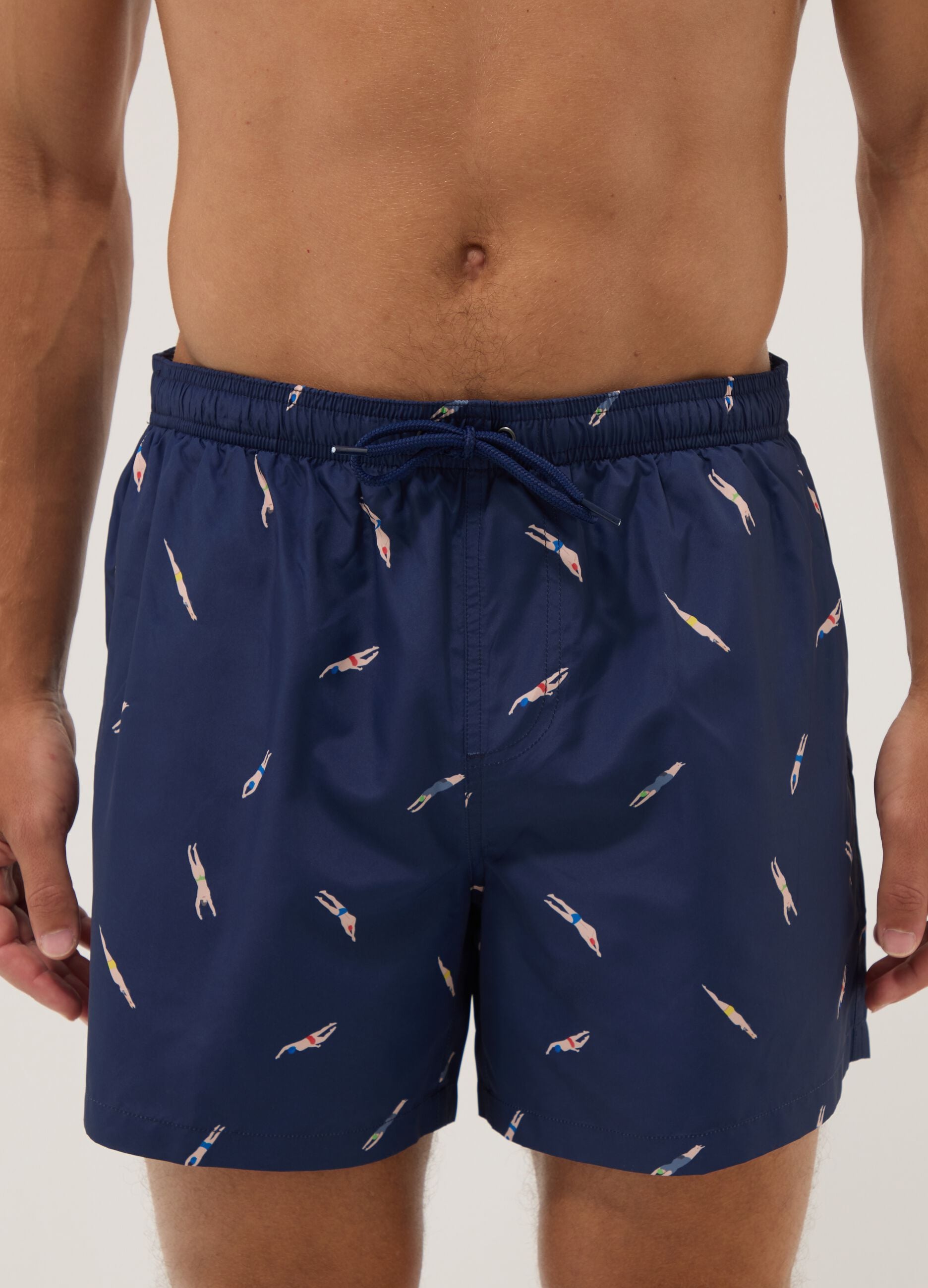 Blue boxer swim shorts with all-over print
