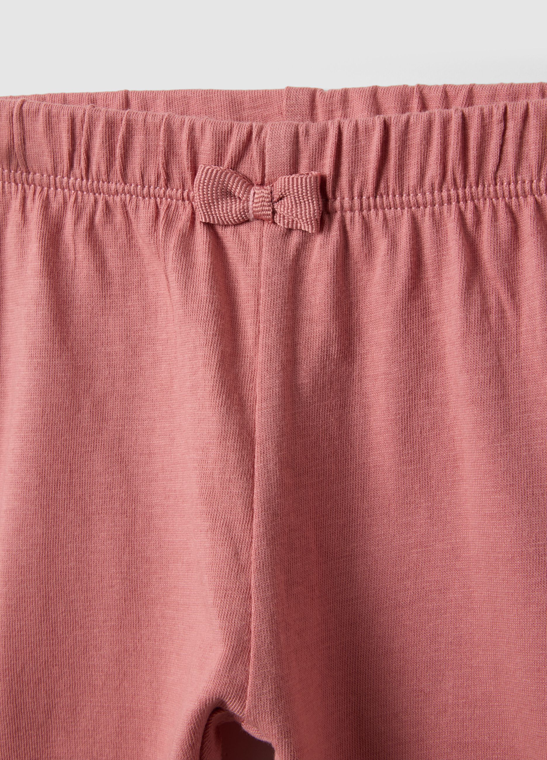 Slim fit pink cotton leggings for newborns with crumpled design