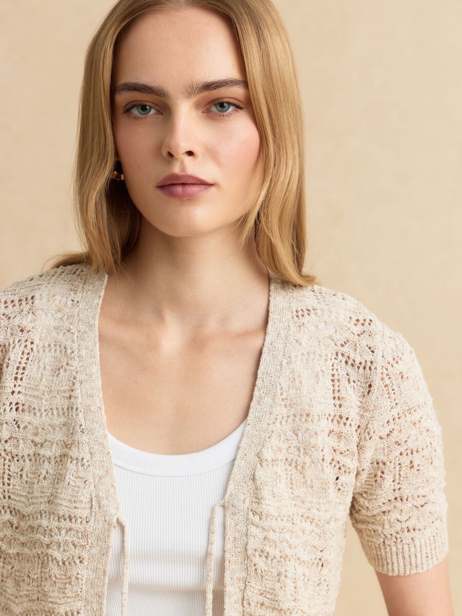 Cardigan beige in stile crochet di misto cotone e lino deep V regular fit_1