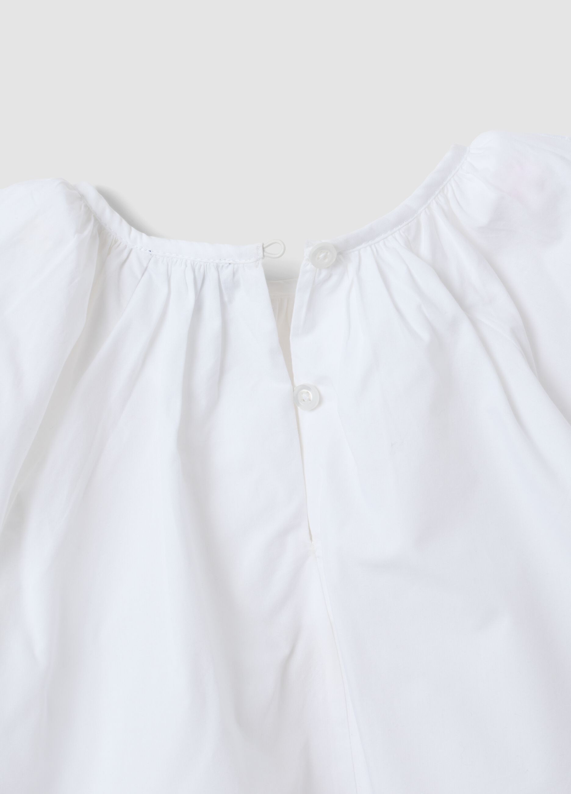 White pure cotton blouse with embroidery and gathered neckline for girls