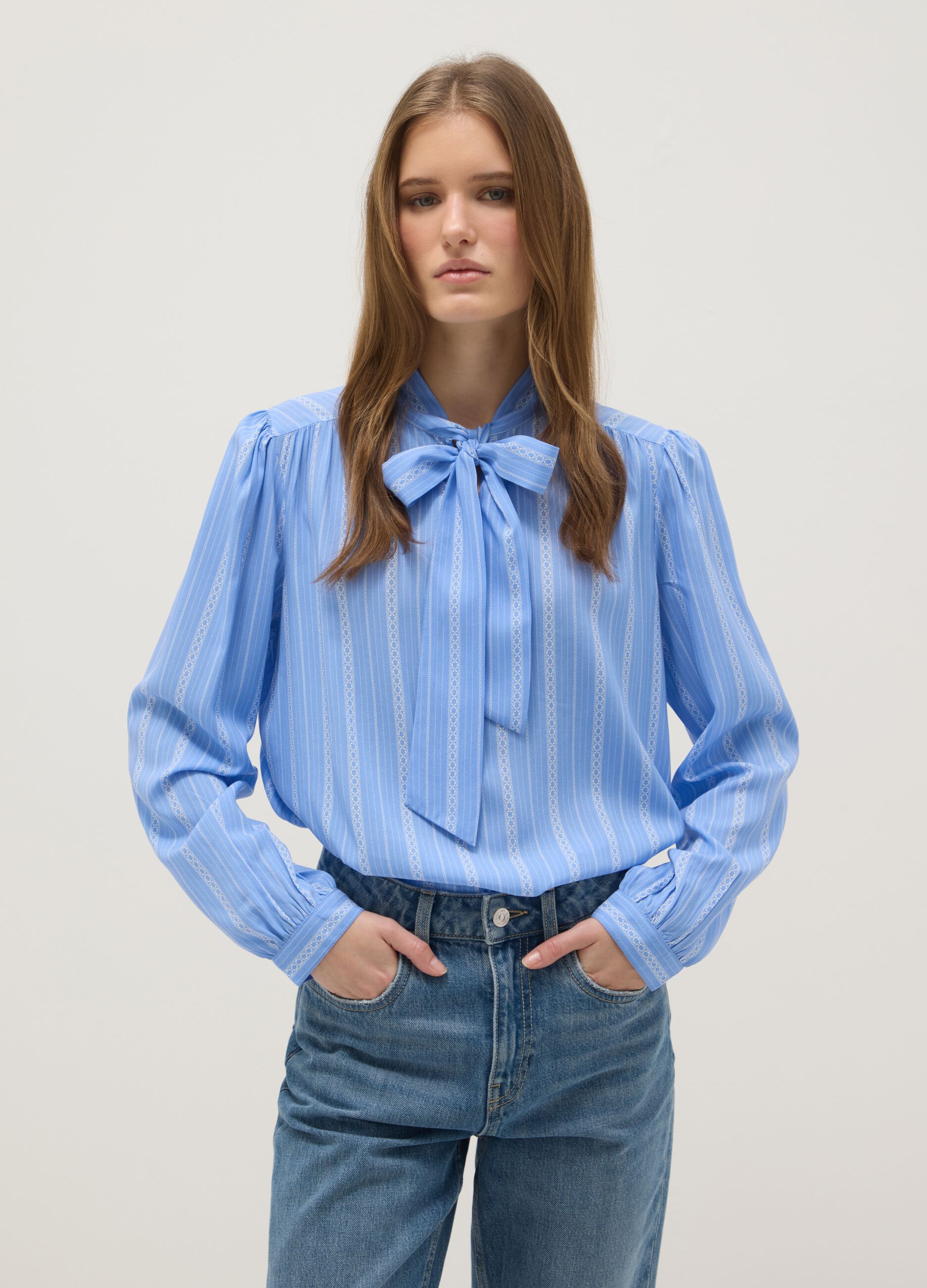 Light blue pure viscose shirt with bow and striped pattern