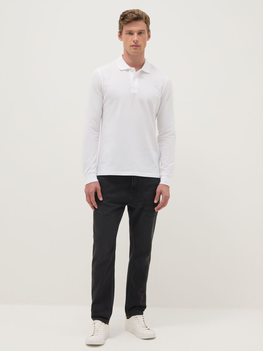 Black denim cotton blend carrot fit jeans_0