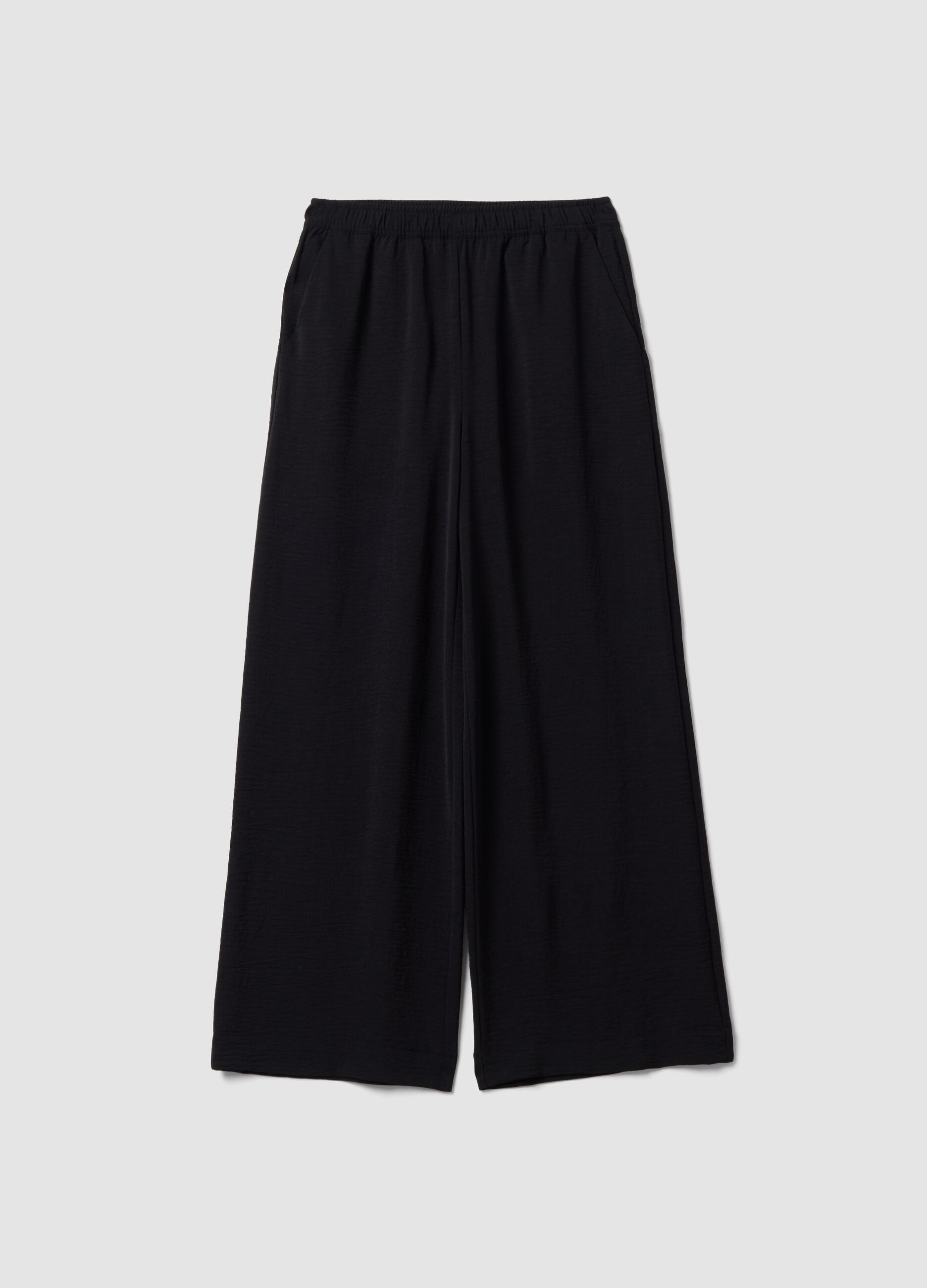 Pantaloni neri wide leg con vita elasticizzata
