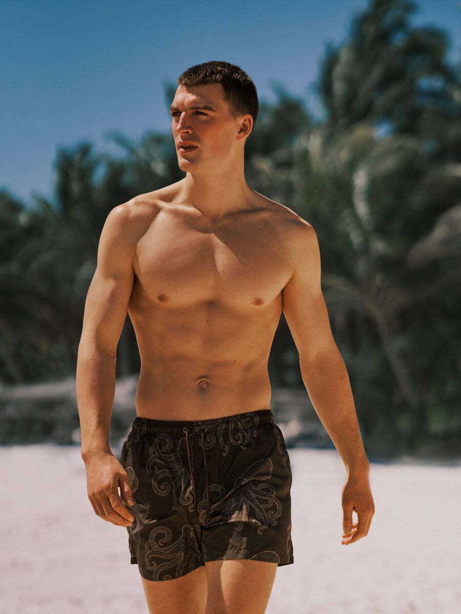 Brown swim shorts with all-over print_0