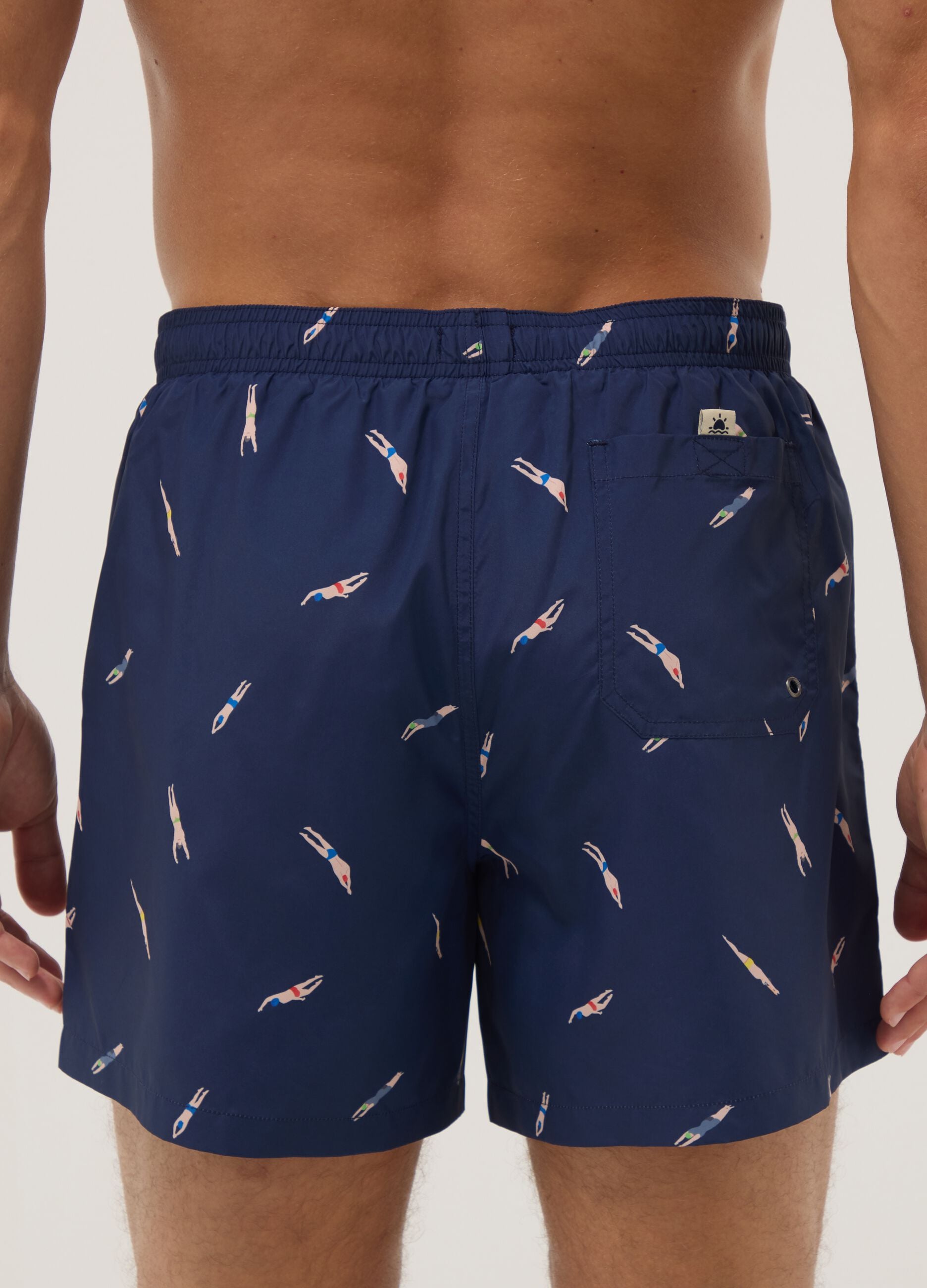 Blue boxer swim shorts with all-over print