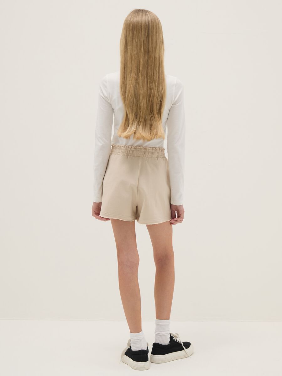 Girls' beige pure cotton shorts with relaxed fit_1