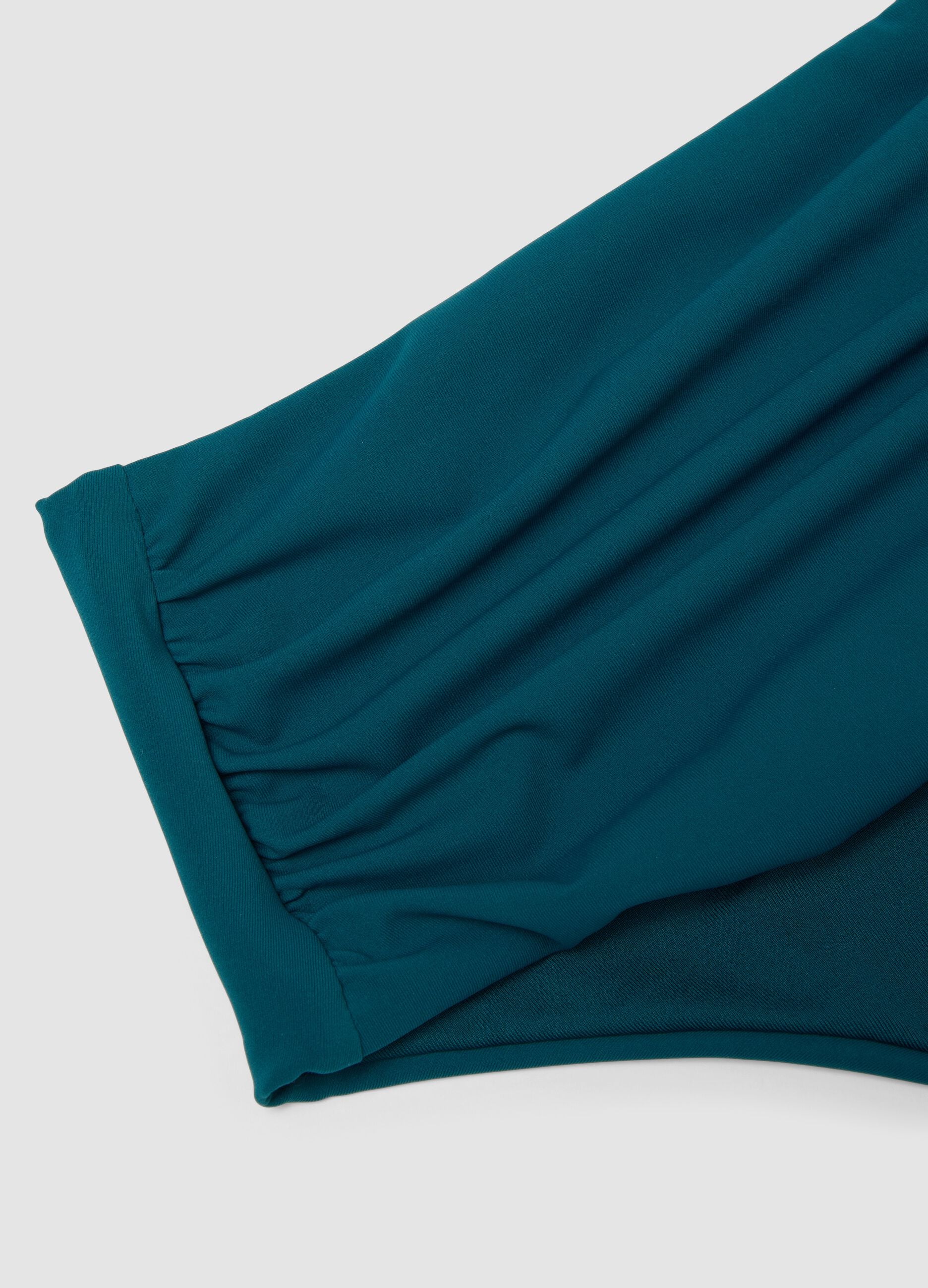 Green high-waisted stretch bikini bottoms with shaping effect