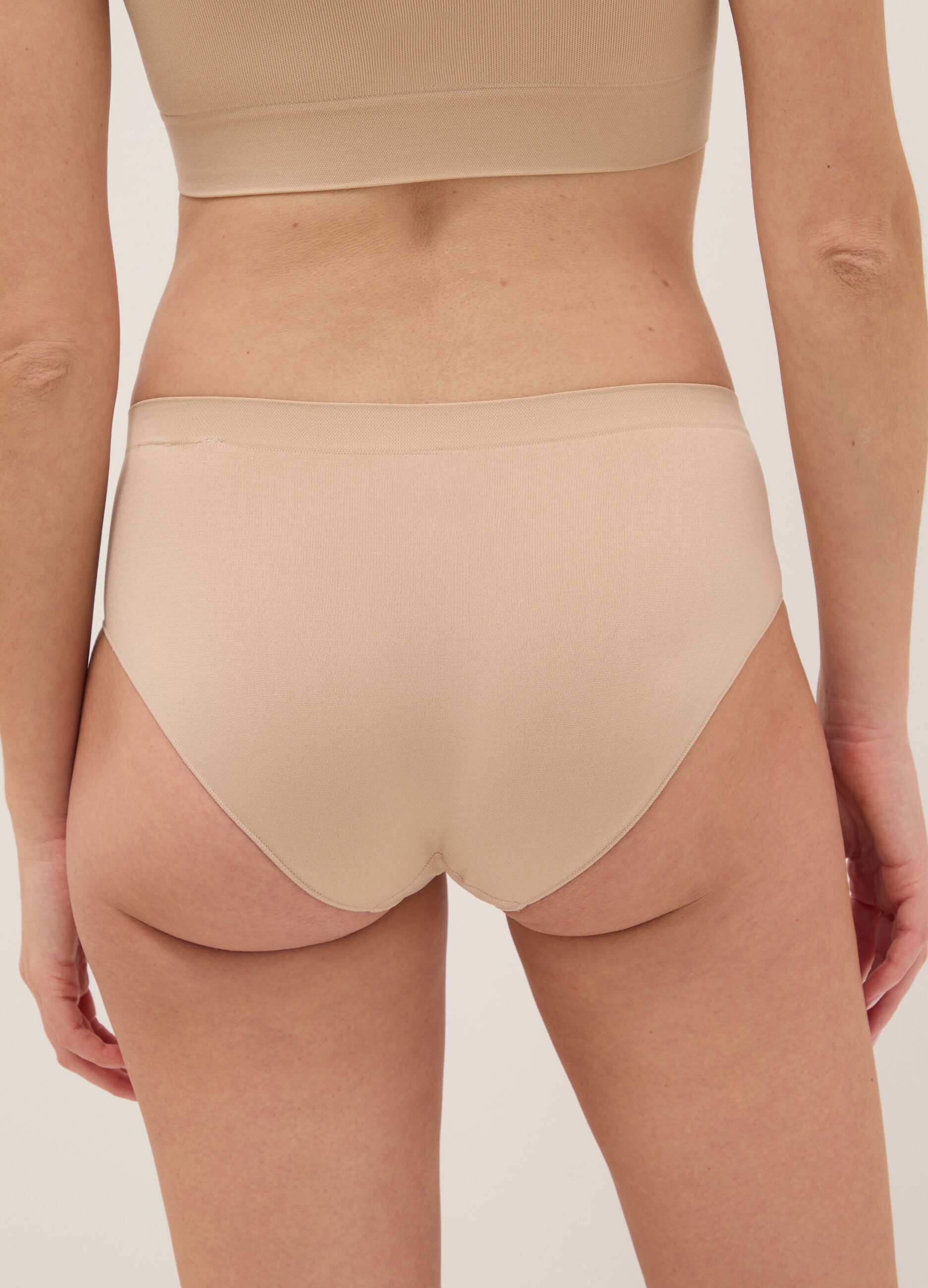High-waisted beige briefs