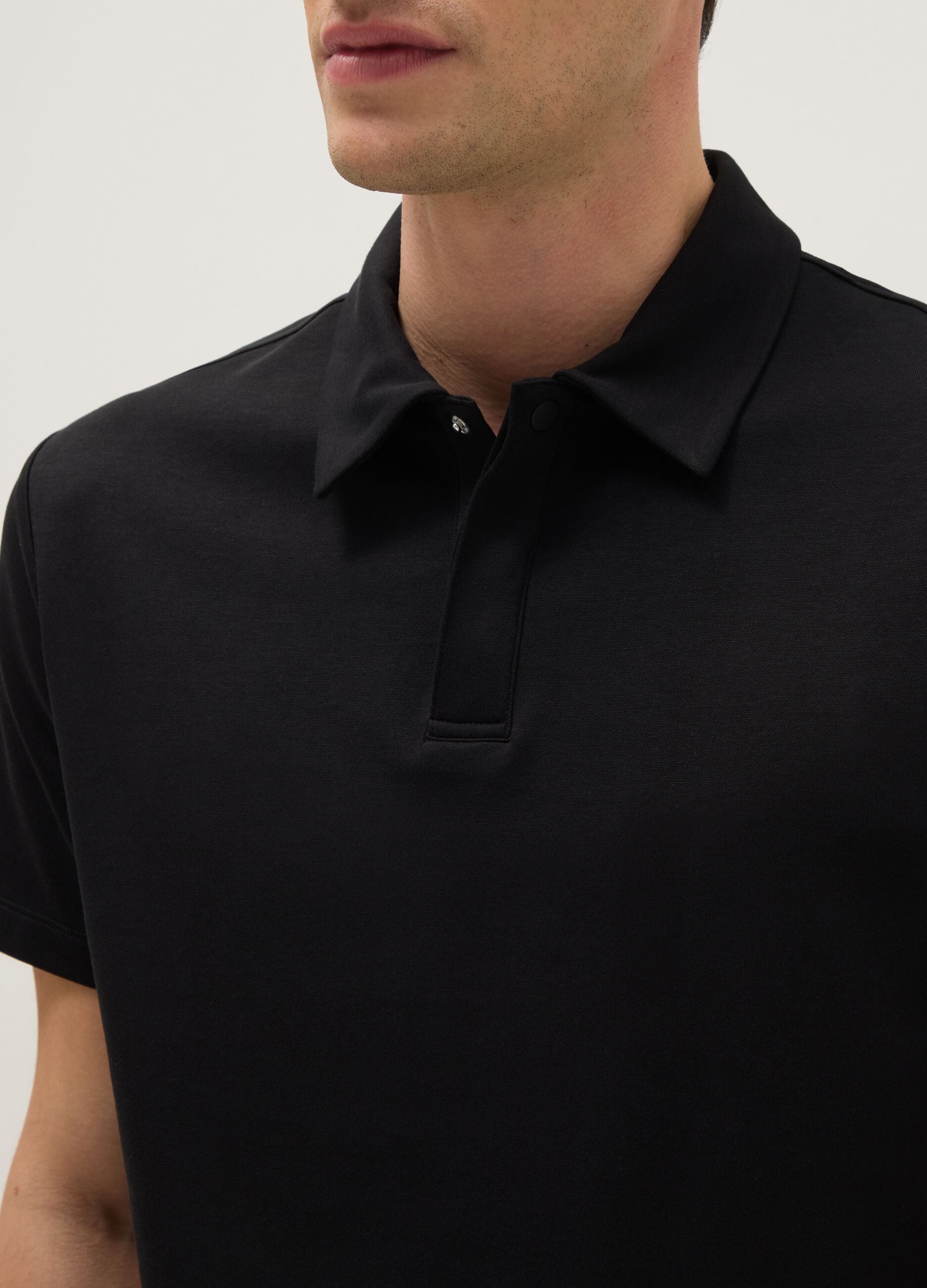 Black short-sleeved cotton blend polo regular fit