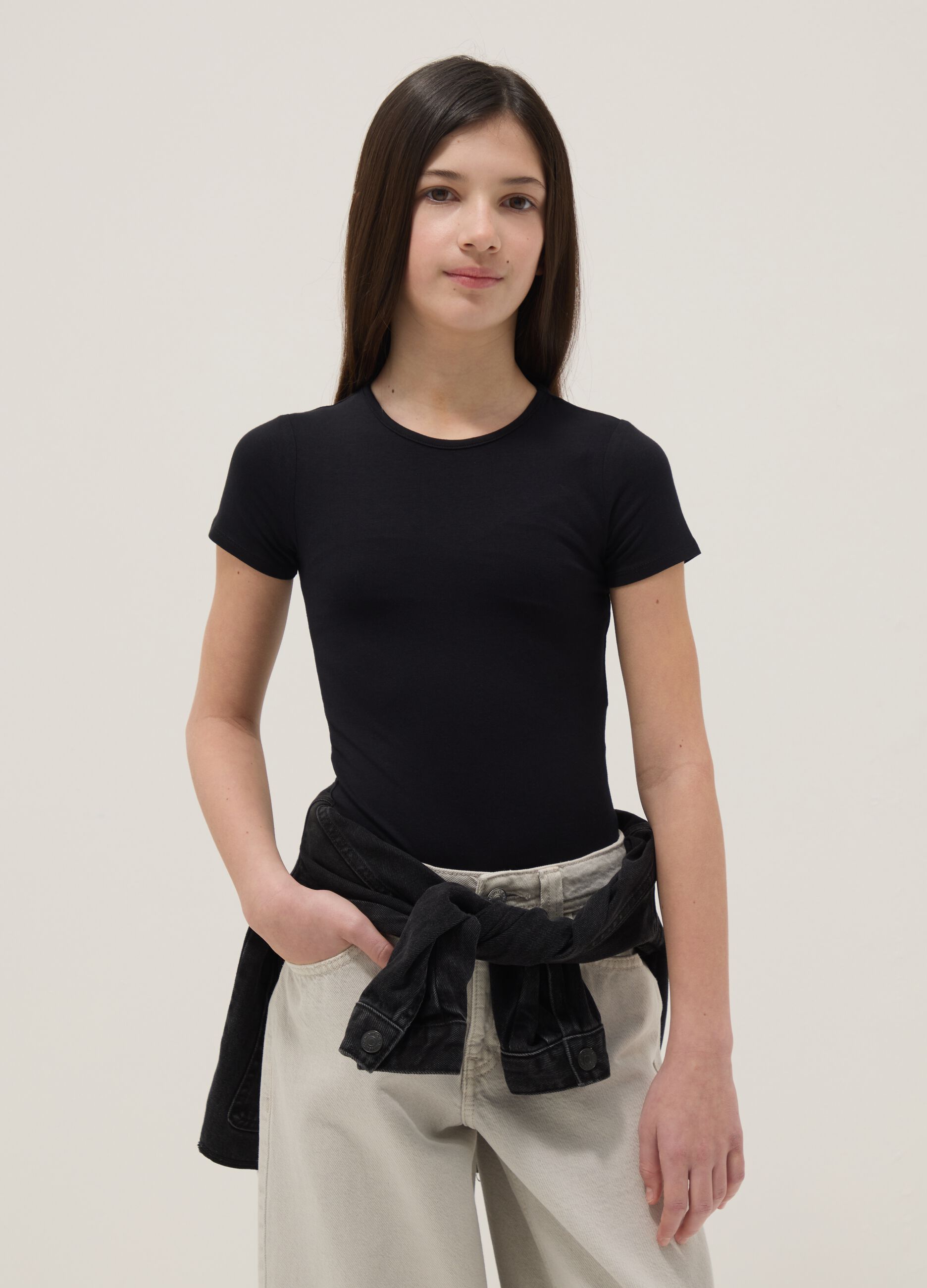 Girls' fitted black stretch cotton bodysuit