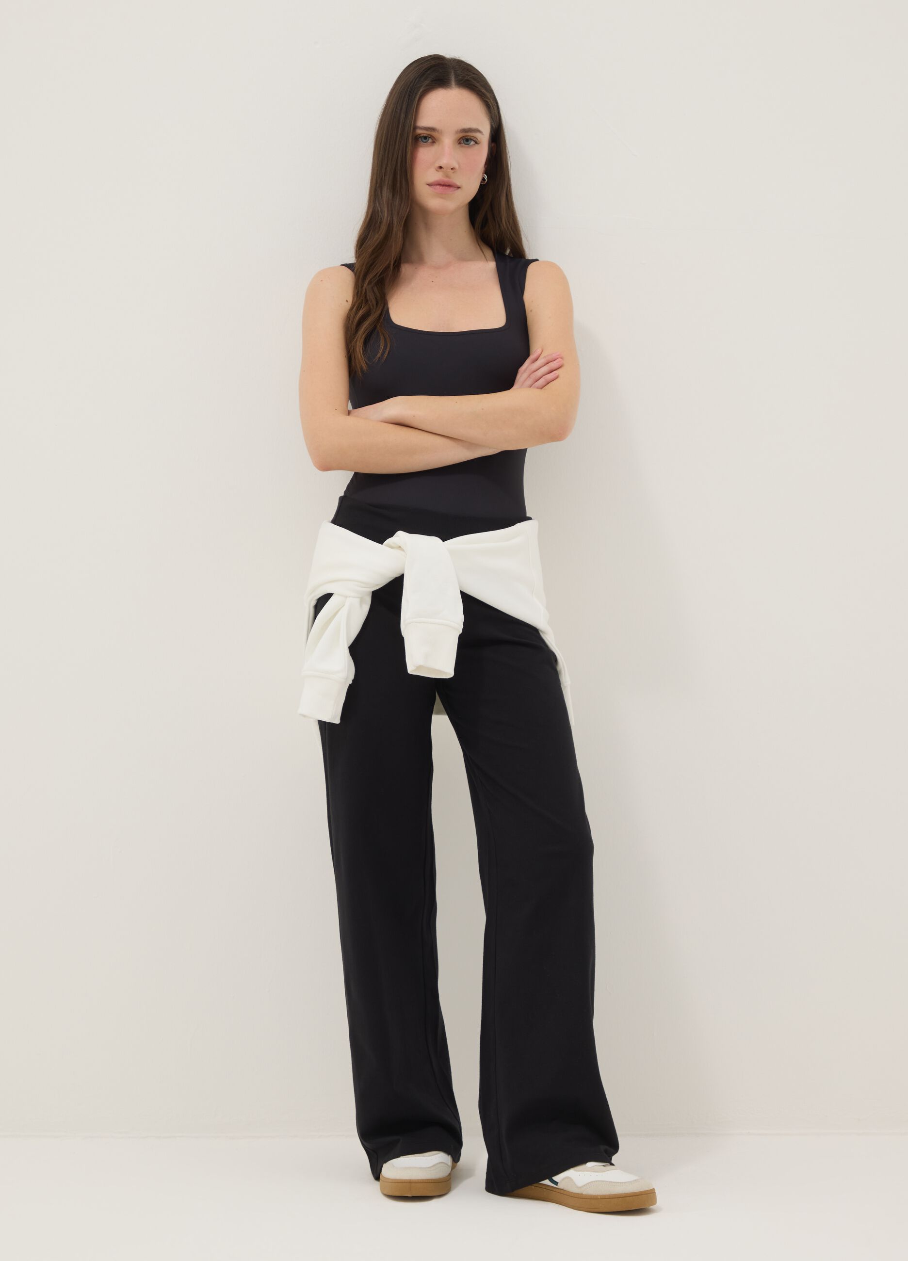 Wide-leg black stretch cotton jogger trousers