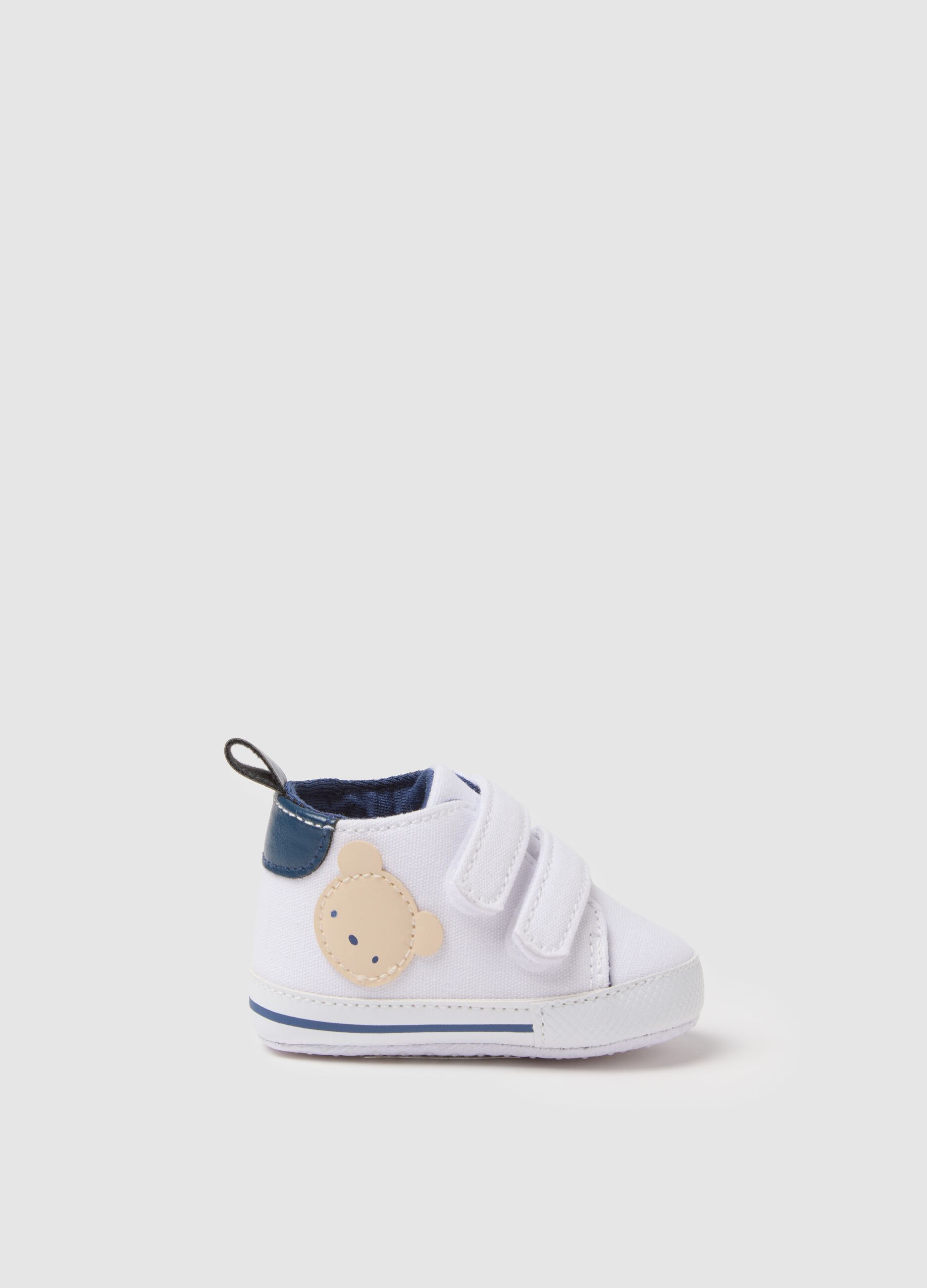 White canvas baby shoes