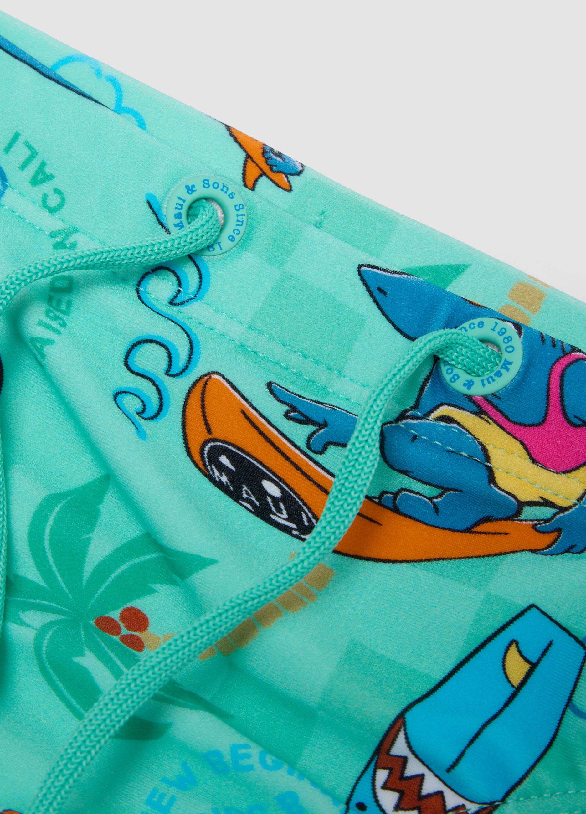 Boys&rsquo; blue stretch swim briefs with print
