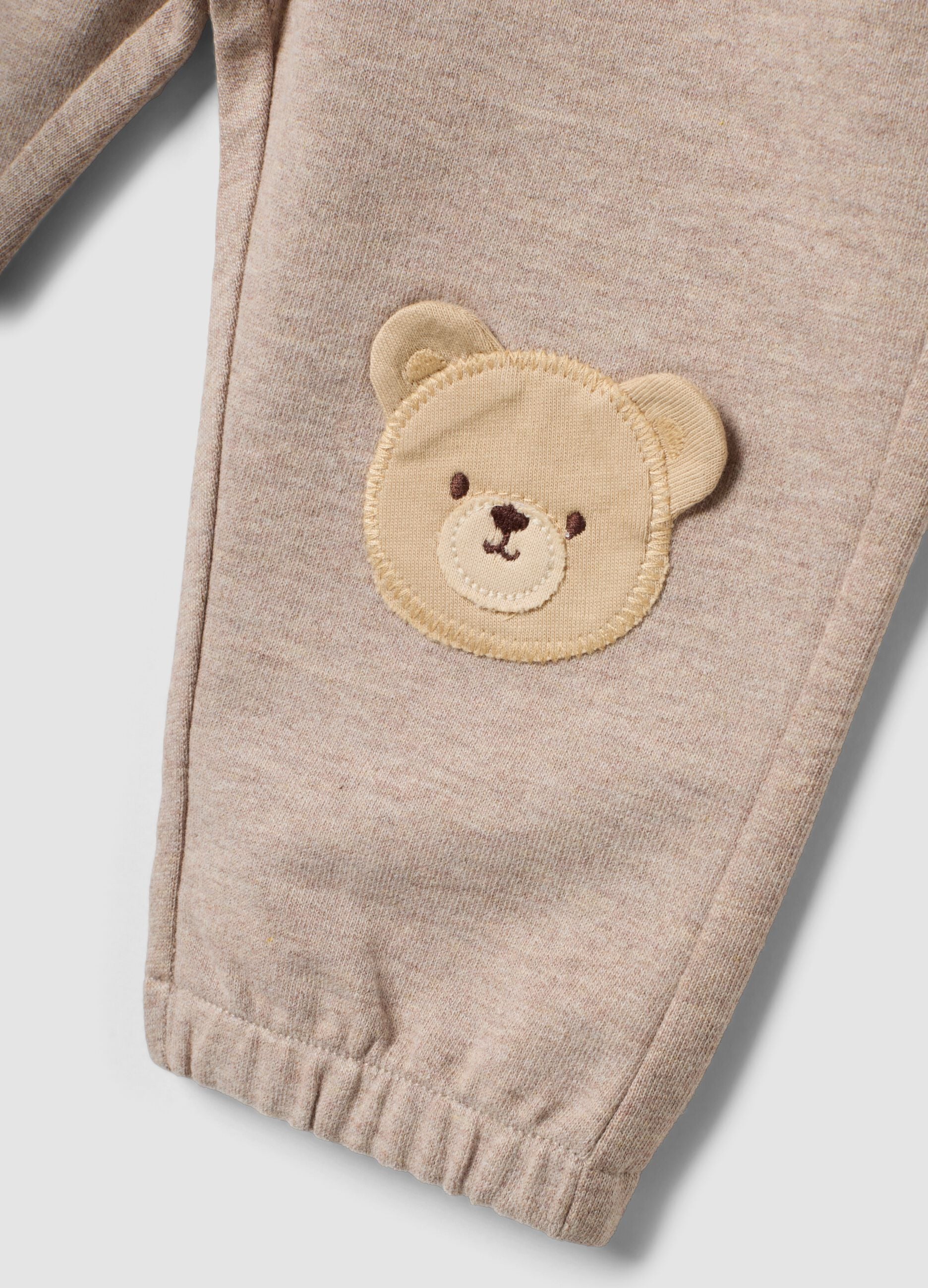 Beige organic cotton baby trousers with elasticated waist