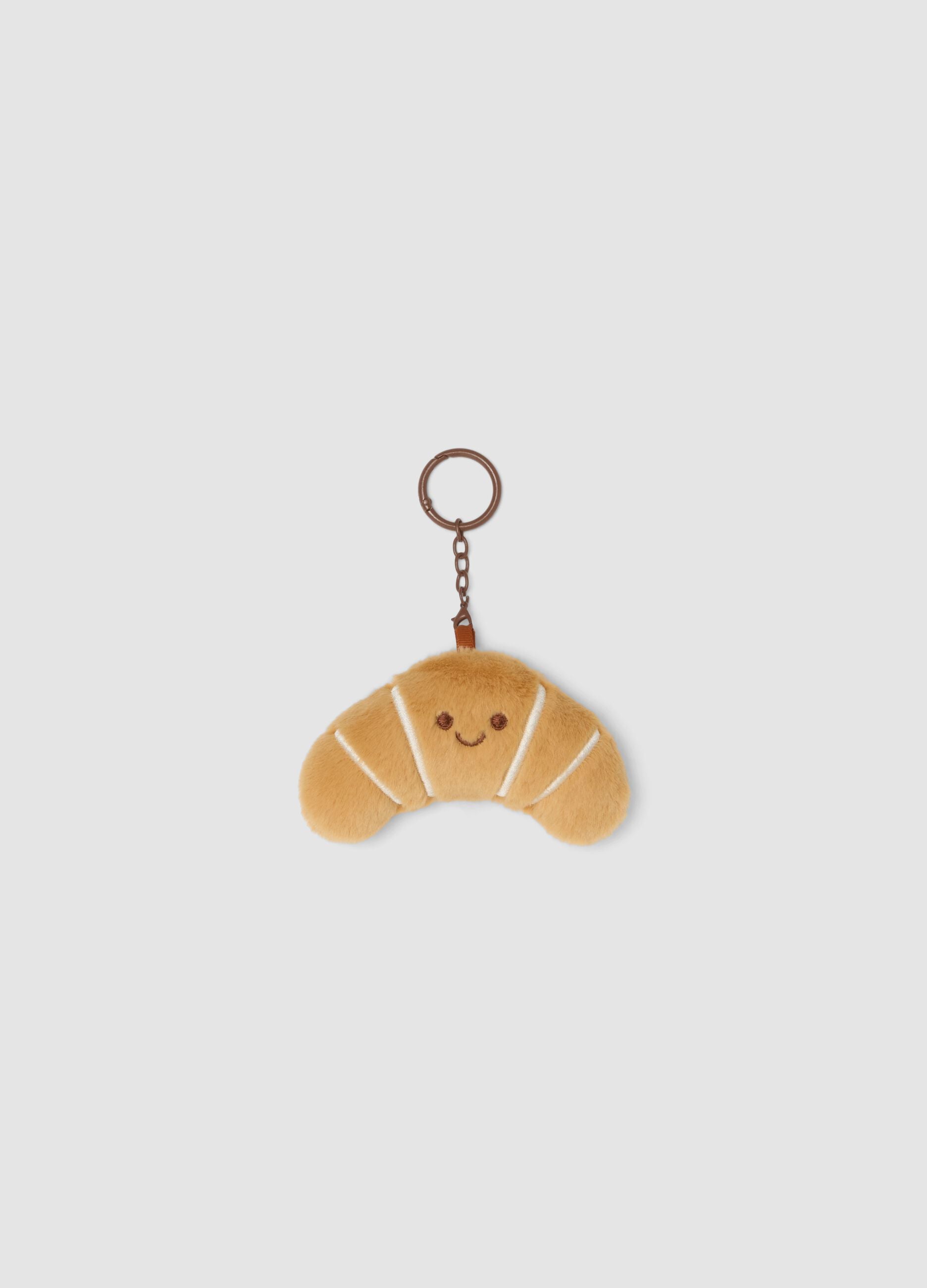 Brown croissant-shaped keyring