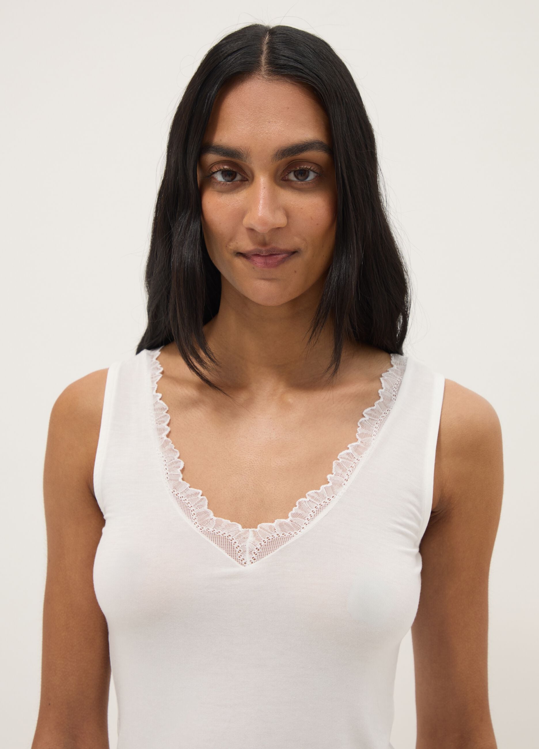 White regular fit vest with lace