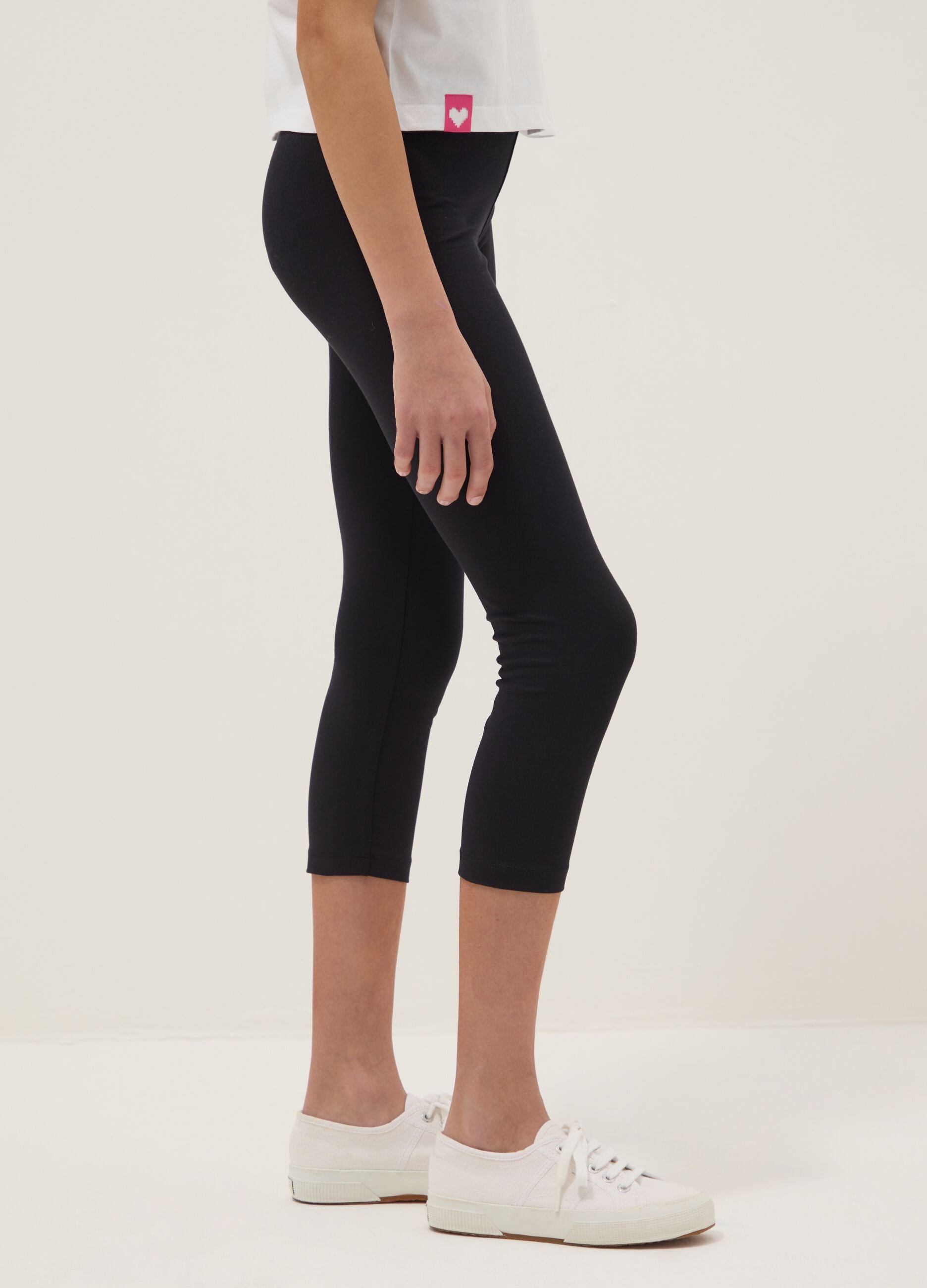 Girls' black stretch cotton slim fit leggings with heart detail