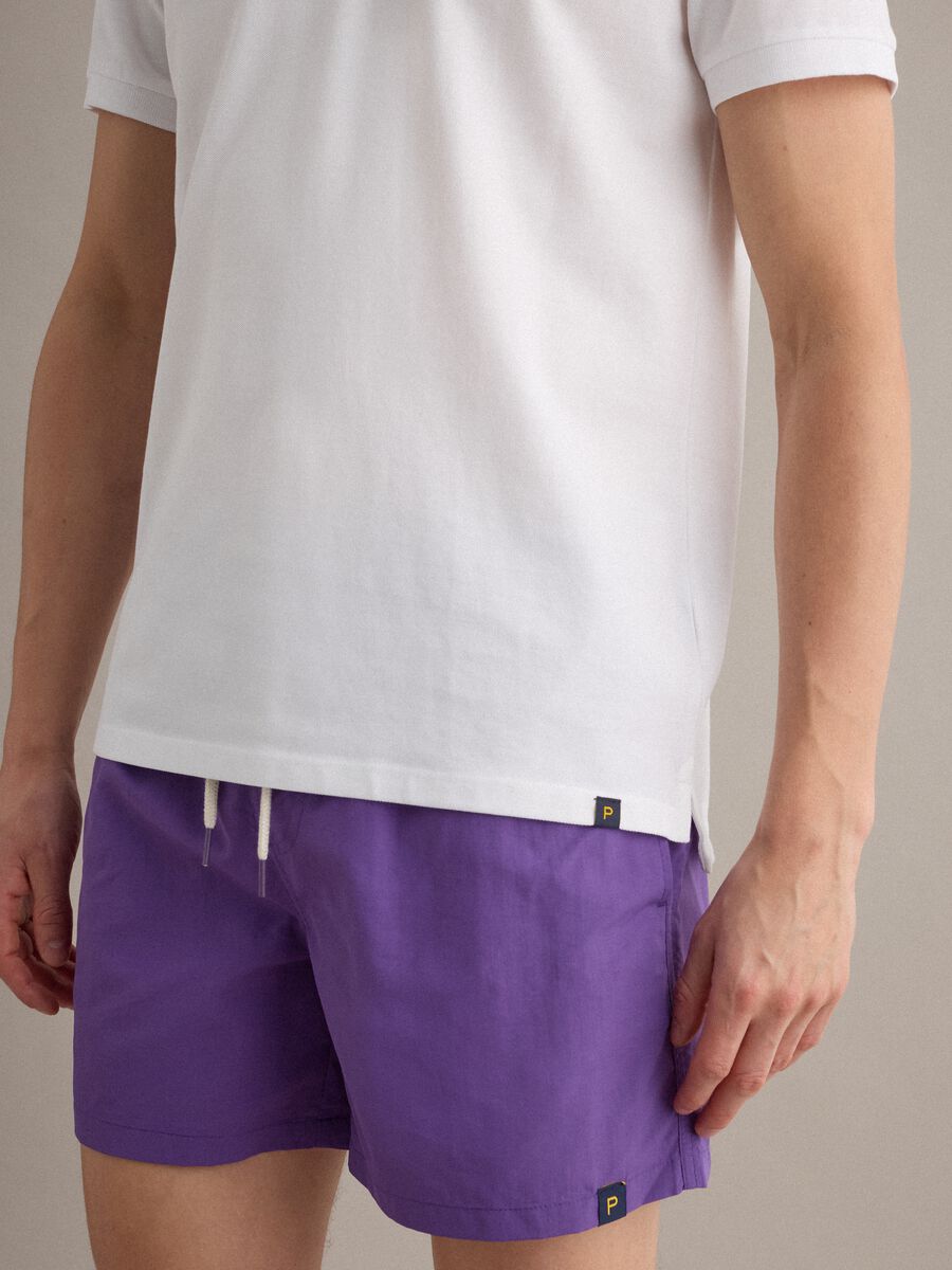 Purple swim shorts with elasticated waistband and drawstring_2