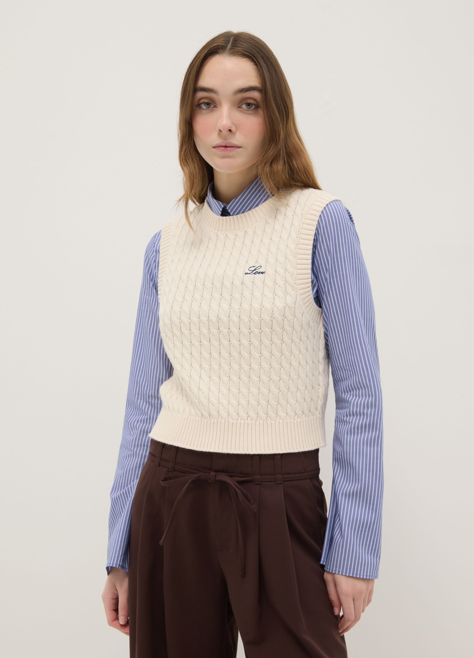 Beige pure cotton regular fit waistcoat with cable knit design