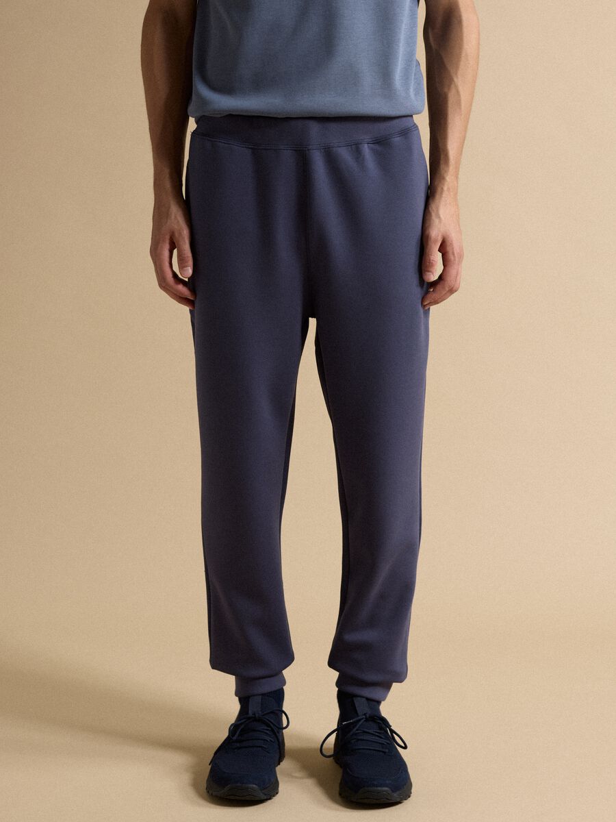 Blue regular-fit joggers in Easy Dry stretch fabric_1