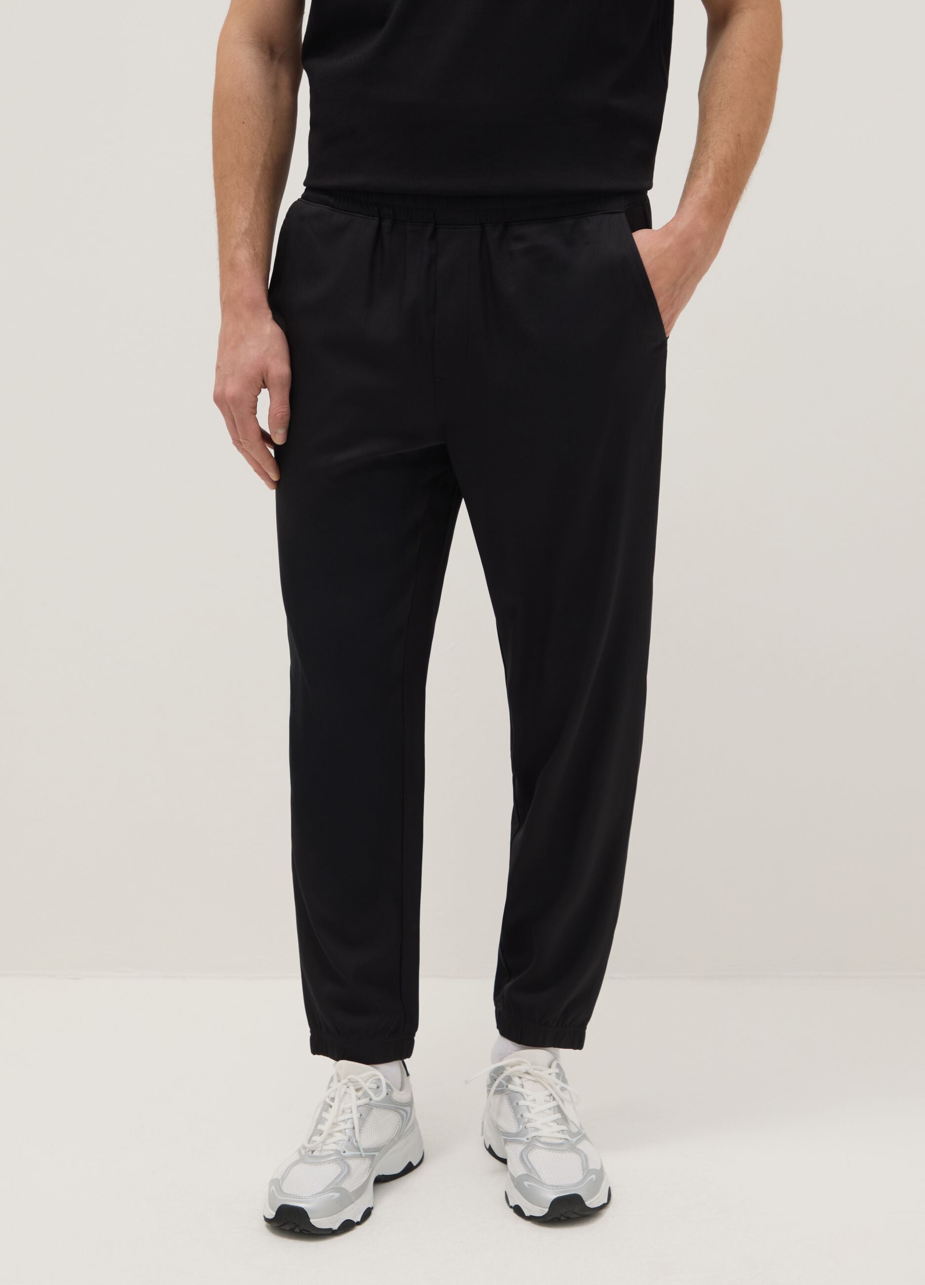Black regular fit trousers with elasticated waist