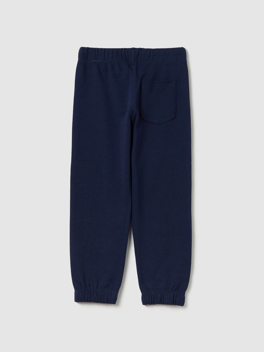Joggers with drawstring and dinosaur print_1