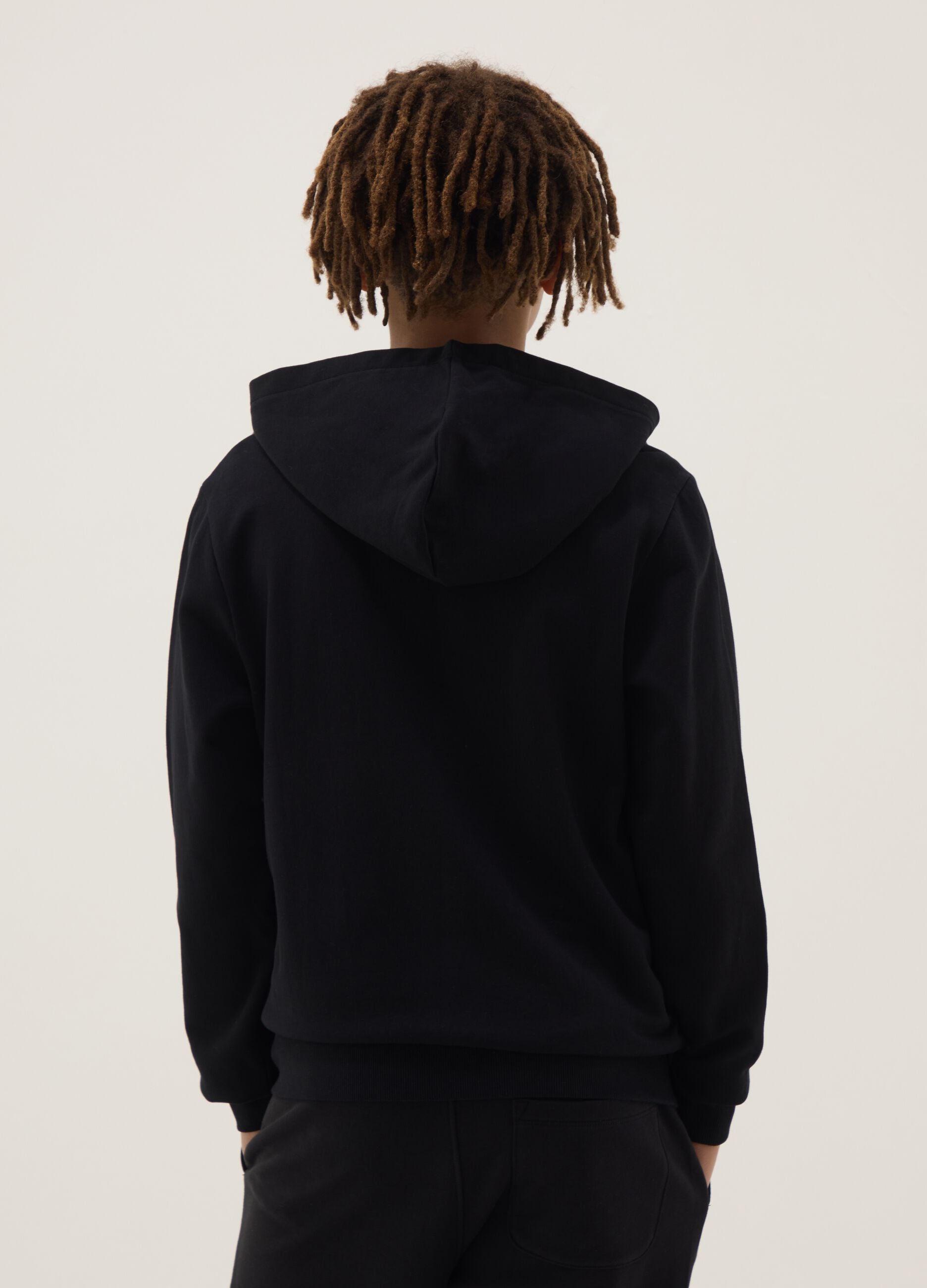 Black hoodie for boys in pure cotton with oversized fit and zip