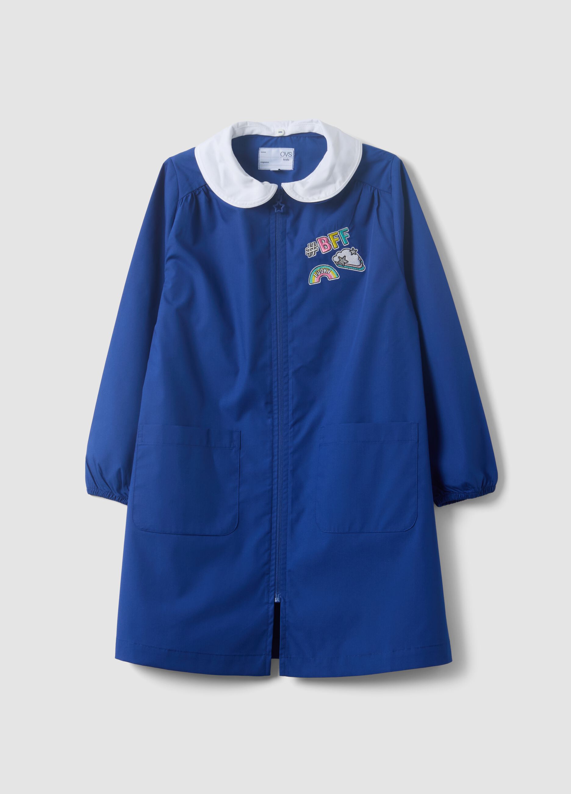 Blue girls&rsquo; school apron with rainbow embroidery