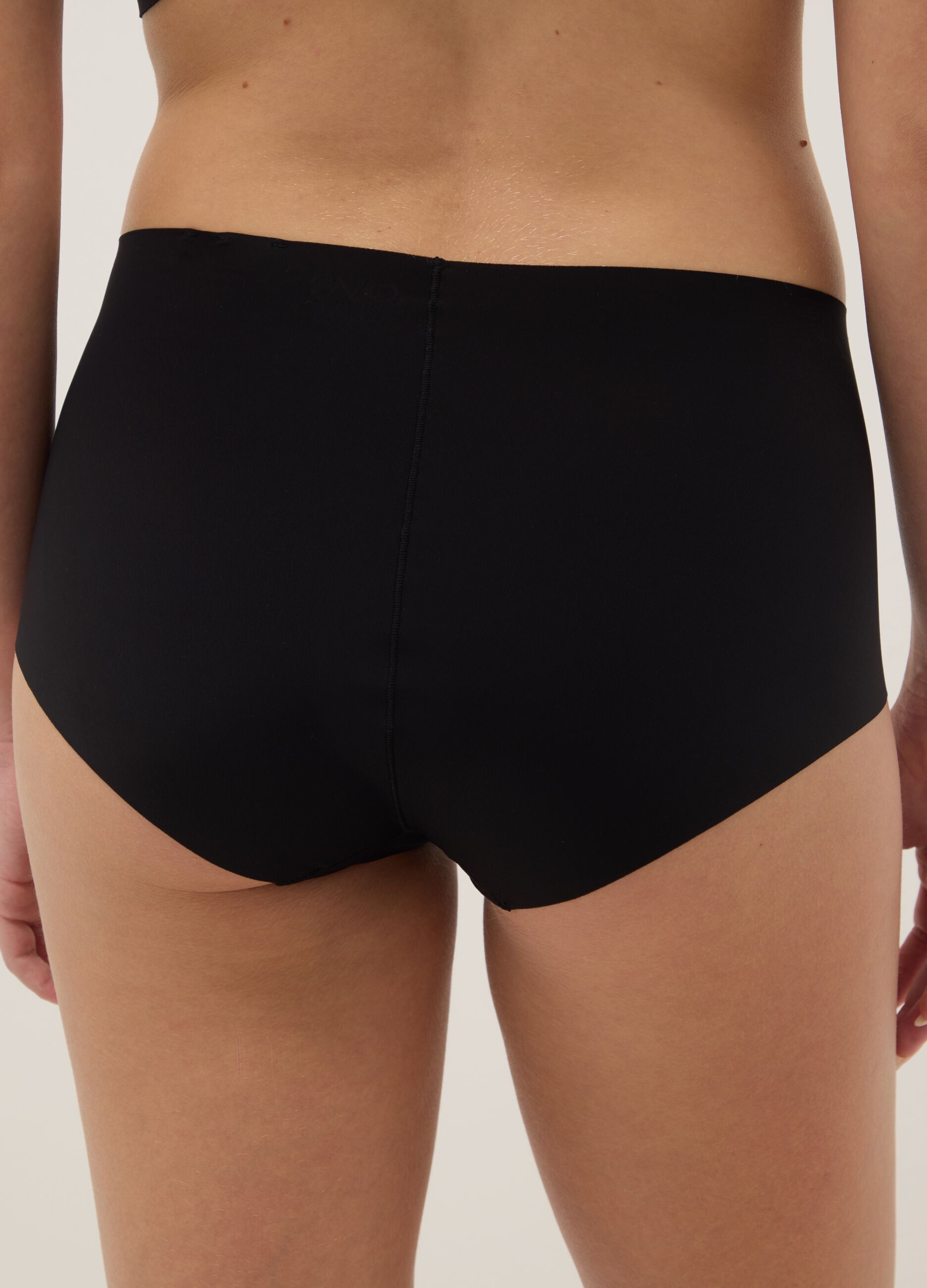 High-waisted black briefs