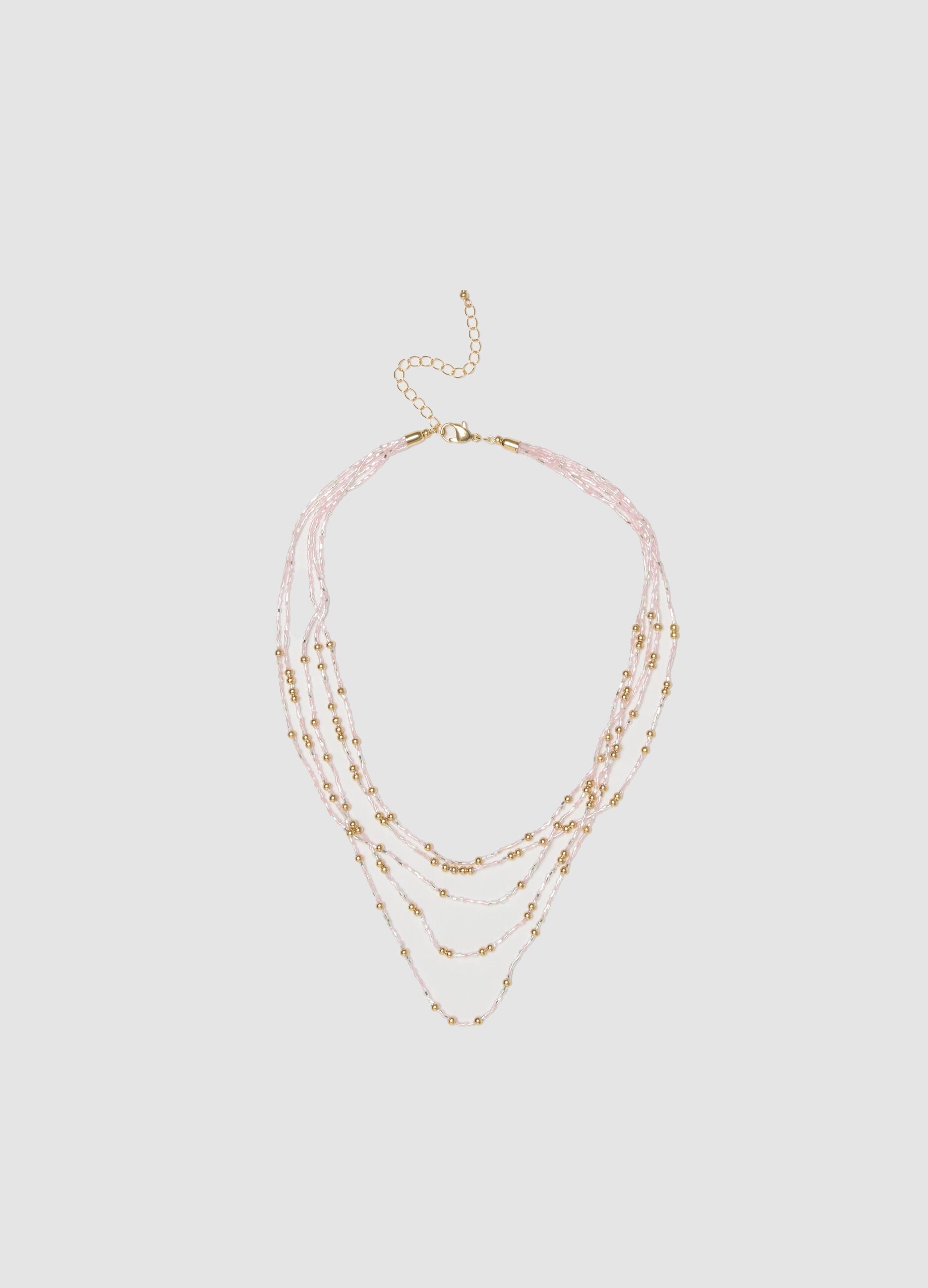 Multi-strand necklace with gold and pink beads