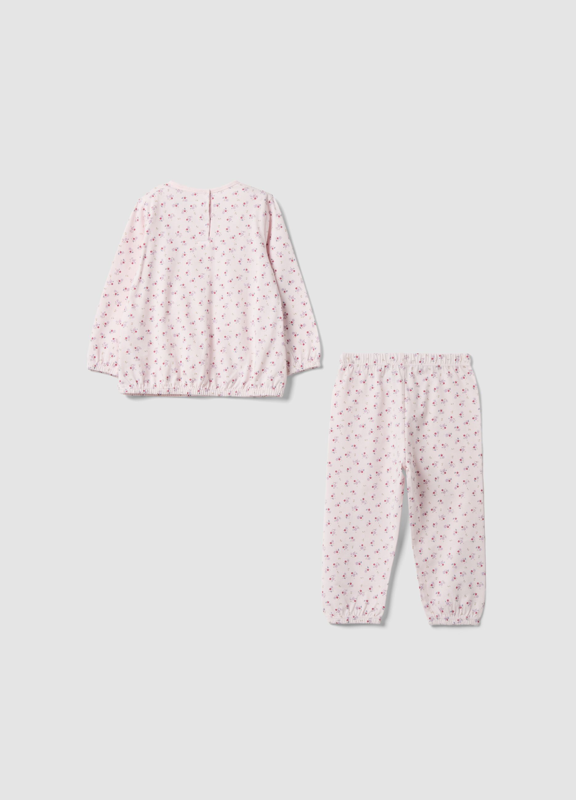 Pink organic cotton jersey pyjamas with floral print for baby girls and girls