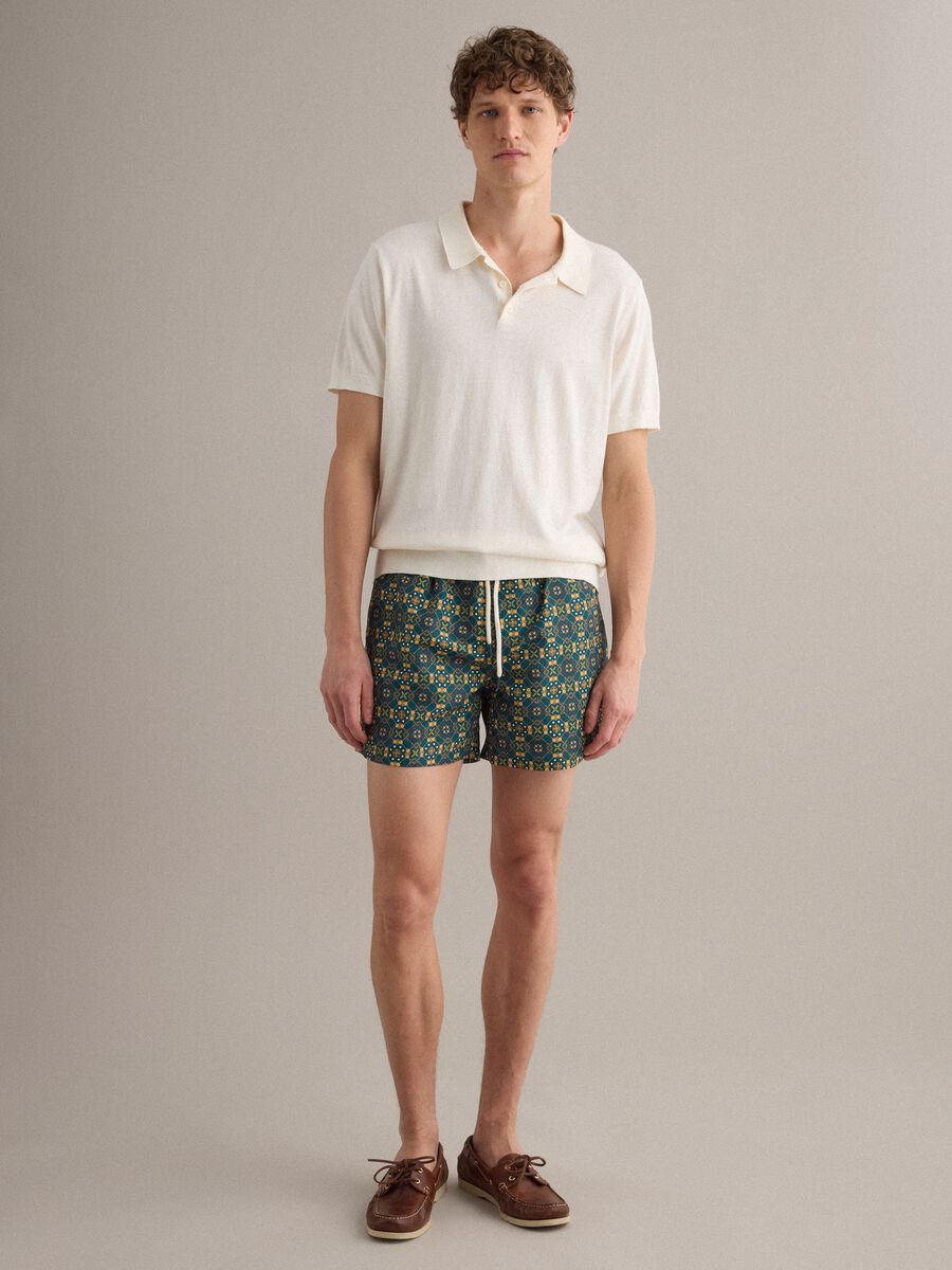 Green patterned swim shorts with elasticated waist_0