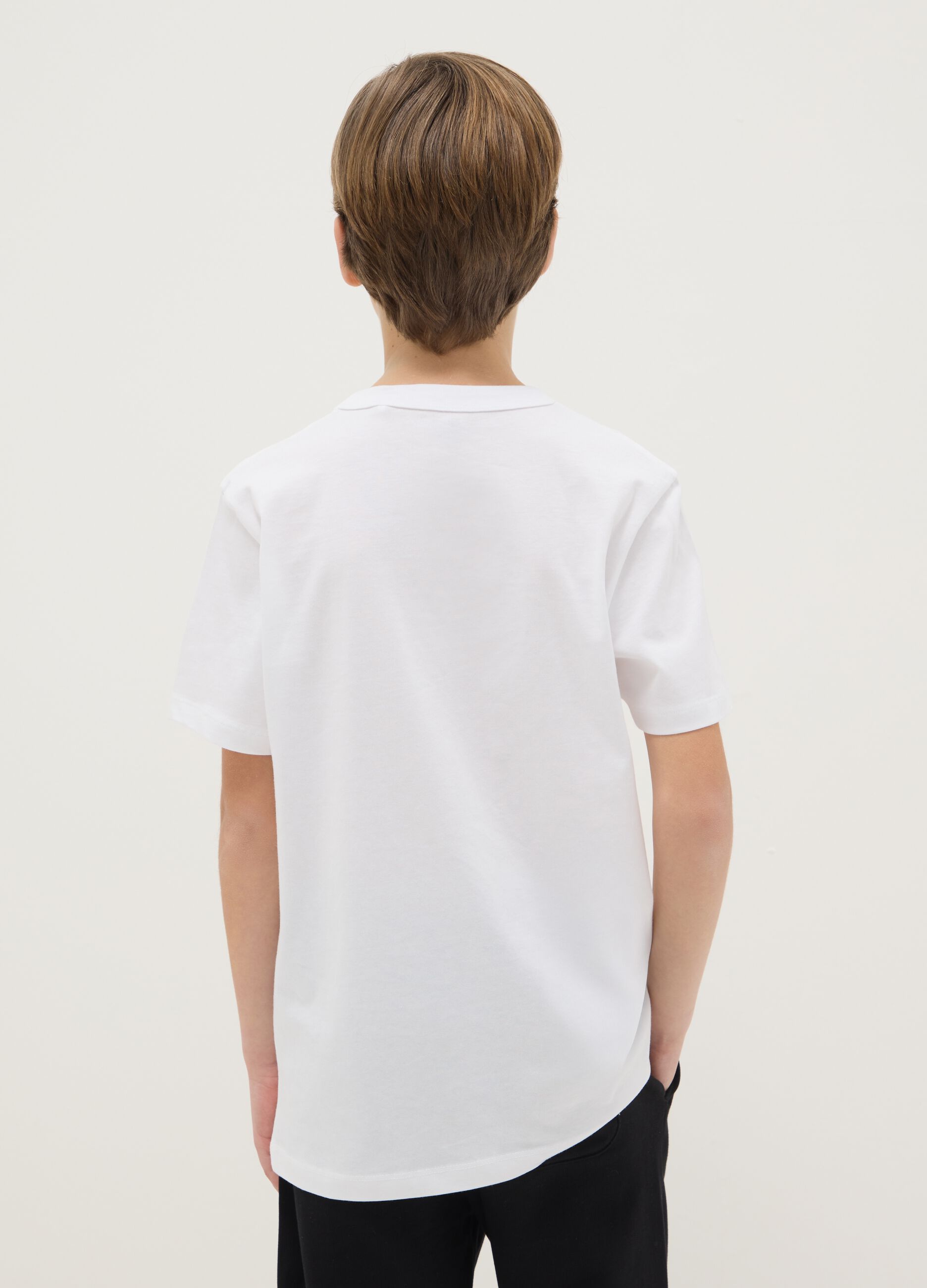 Boy's white crew neck T-shirt in pure cotton over fit