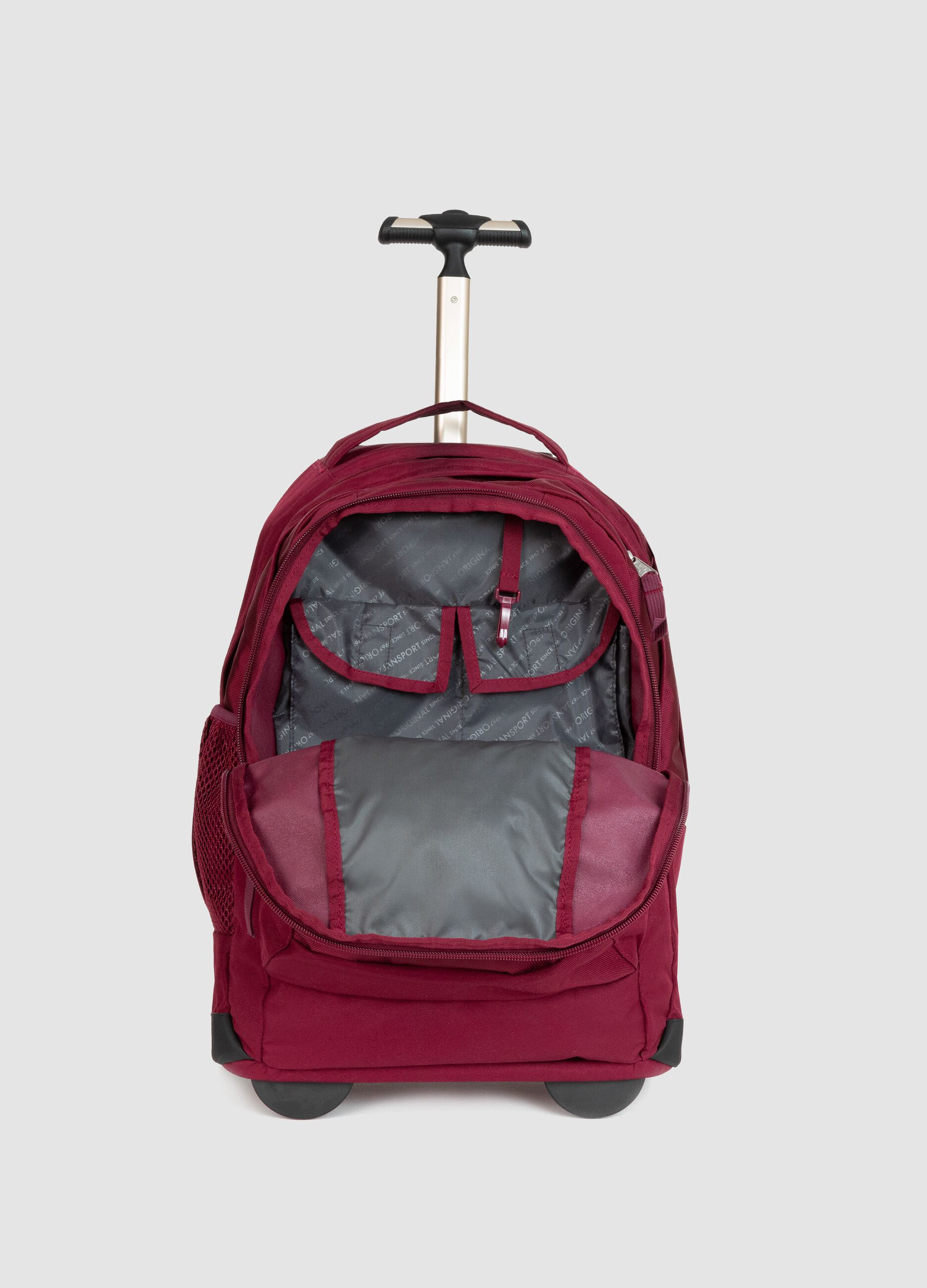 Red wheeled backpack with trolley handle and zip pockets