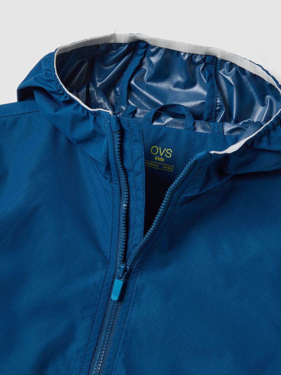 Blue waterproof regular fit jacket with hood and zip for kids_2