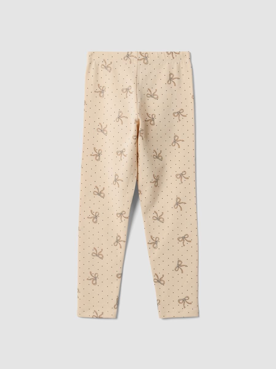 Leggings skinny beige in cotone organico elasticizzato con fiocchi per bambina_1