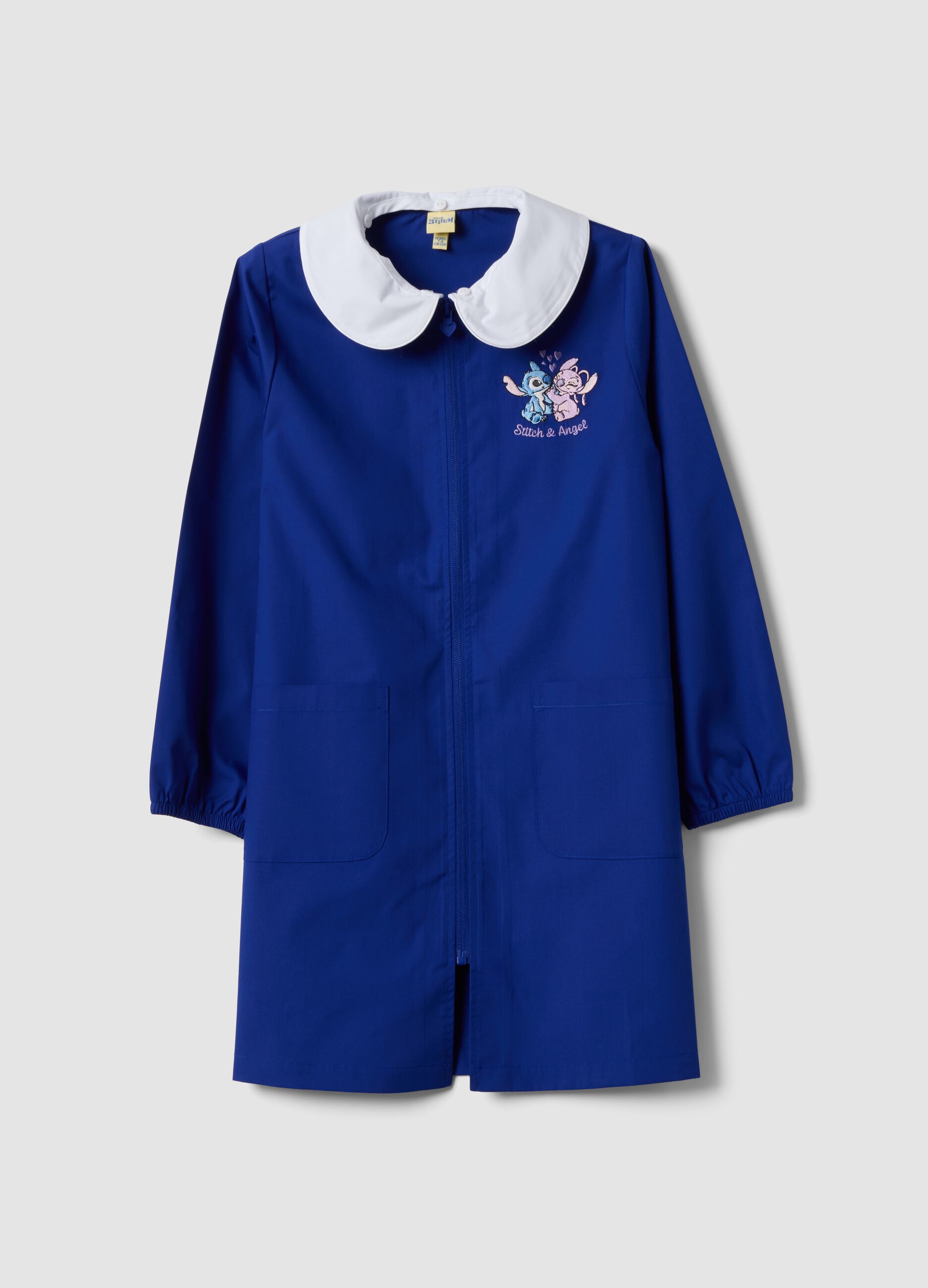 Blue girls&rsquo; school apron with white collar and Stitch embroidery