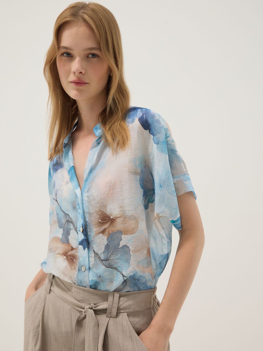 Light blue lyocell-blend shirt with floral print_0