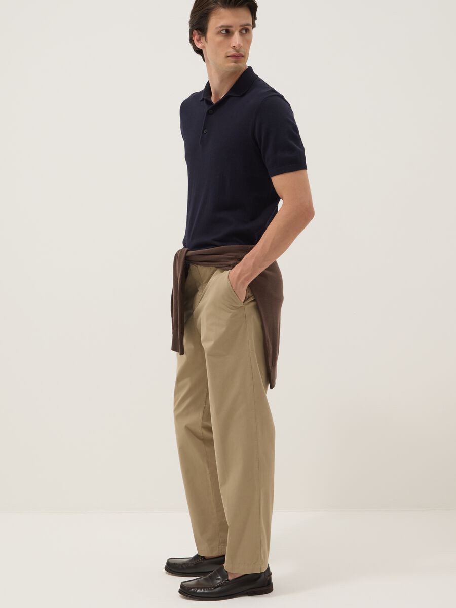 Beige pure cotton carrot-fit chino trousers_1