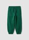 Green pure cotton jogger trousers with elasticated waist for boys_0