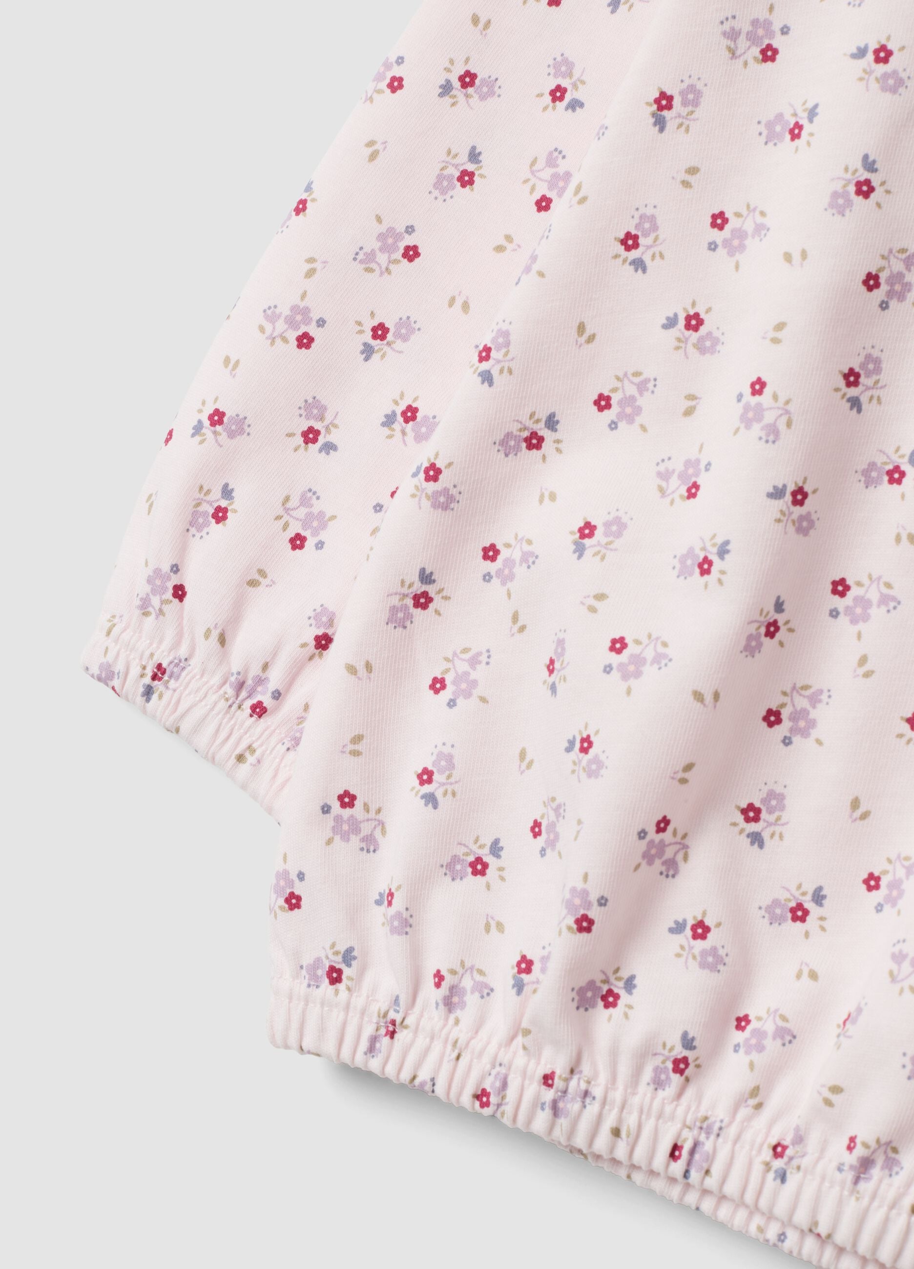 Pink organic cotton jersey pyjamas with floral print for baby girls and girls