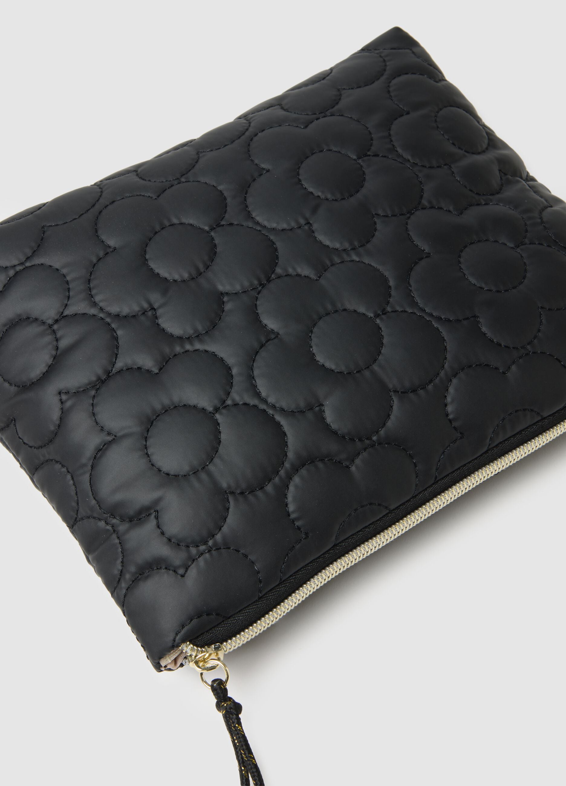 Black pouch with zip and floral pattern