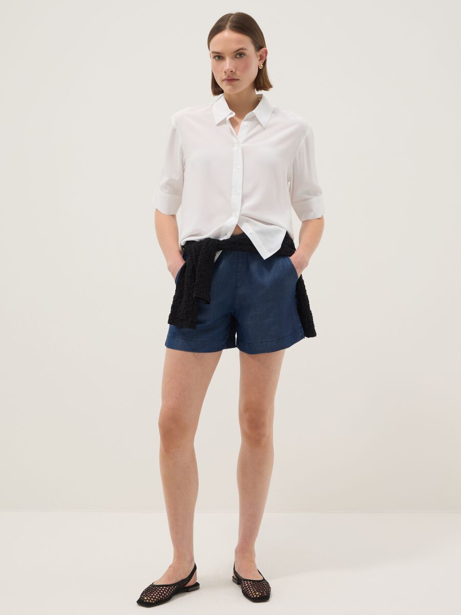 Blue denim shorts in pure lyocell with elasticated waist, regular fit_0