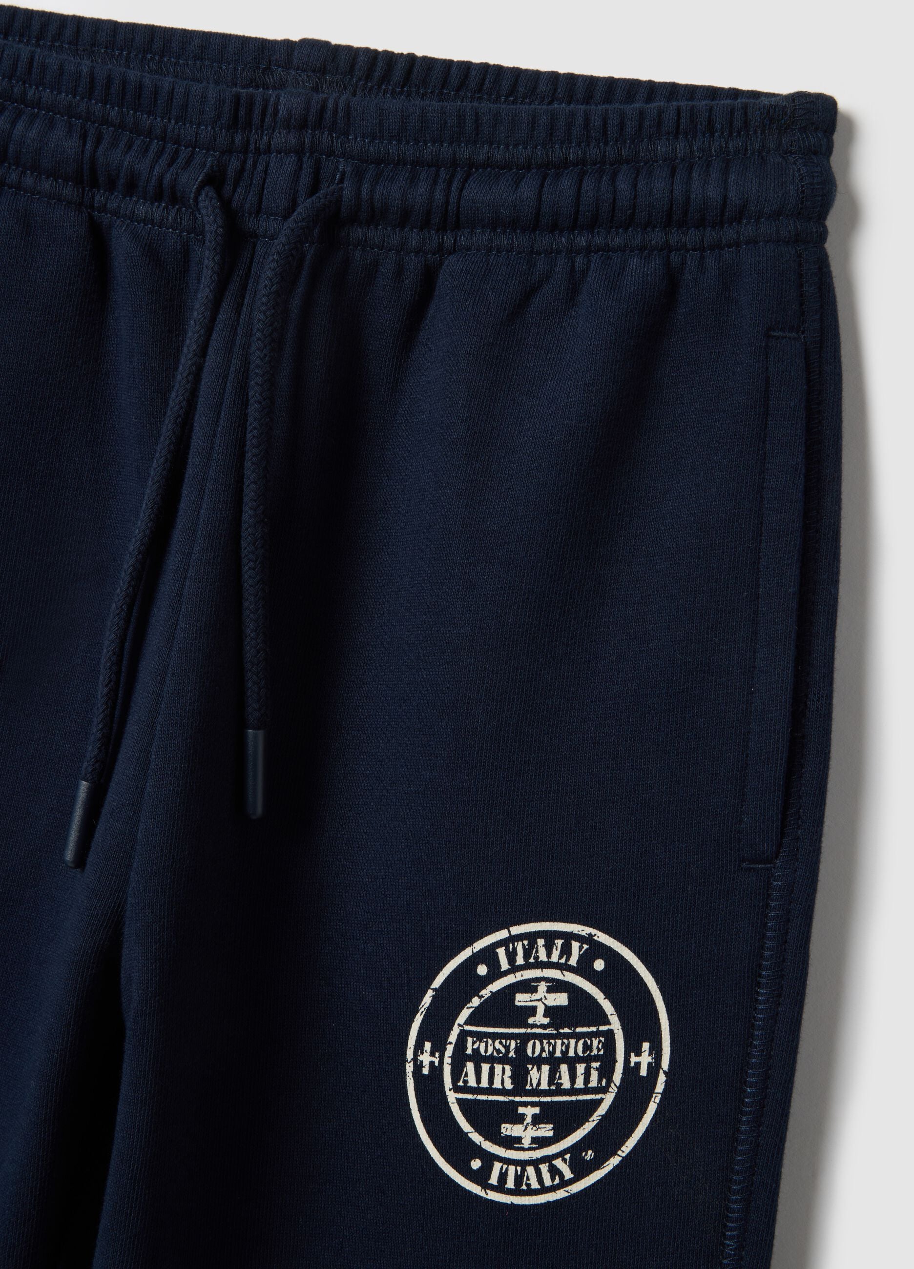 Kids' blue jogger trousers in pure cotton, regular fit with logo