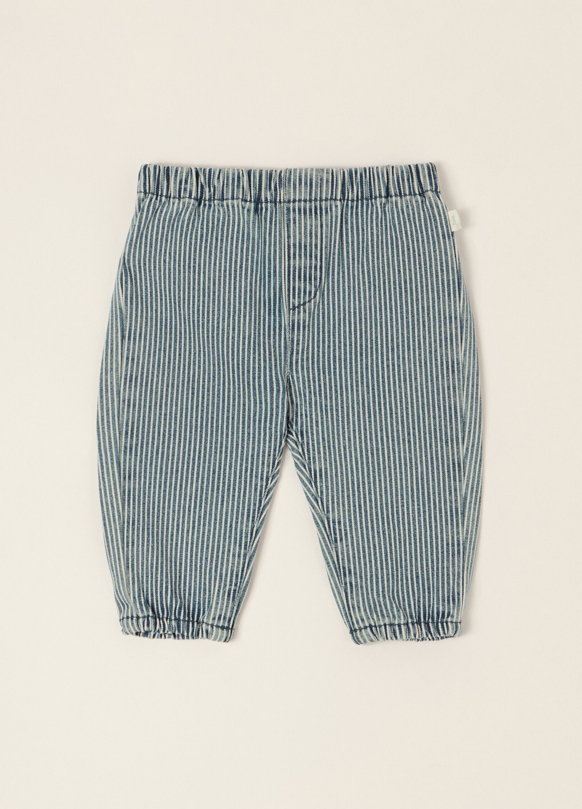 Baby striped denim trousers in a cotton, viscose and lyocell blend
