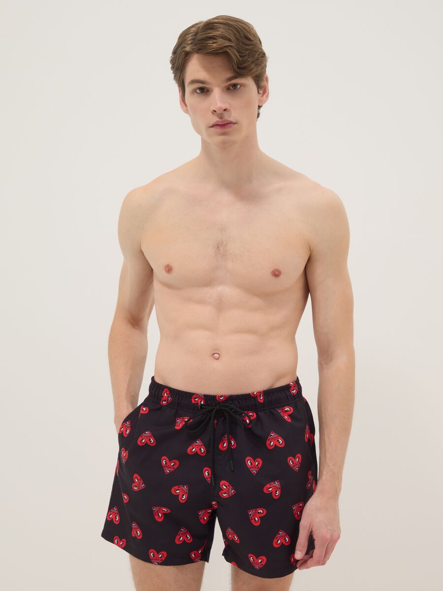 Black beach boxers with Keith Haring heart prints_0